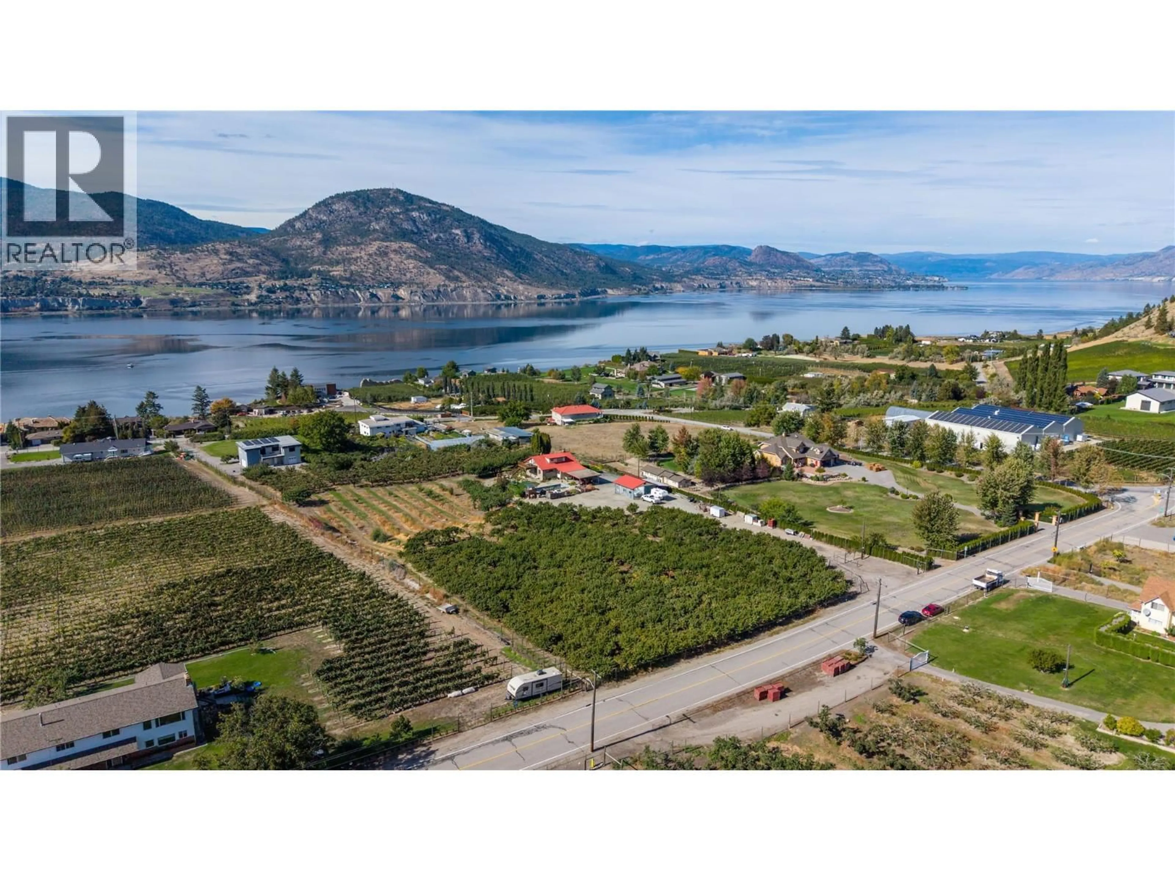 A pic from outside/outdoor area/front of a property/back of a property/a pic from drone, water/lake/river/ocean view for 235 MIDDLE BENCH ROAD NORTH, Penticton British Columbia V2A8S5
