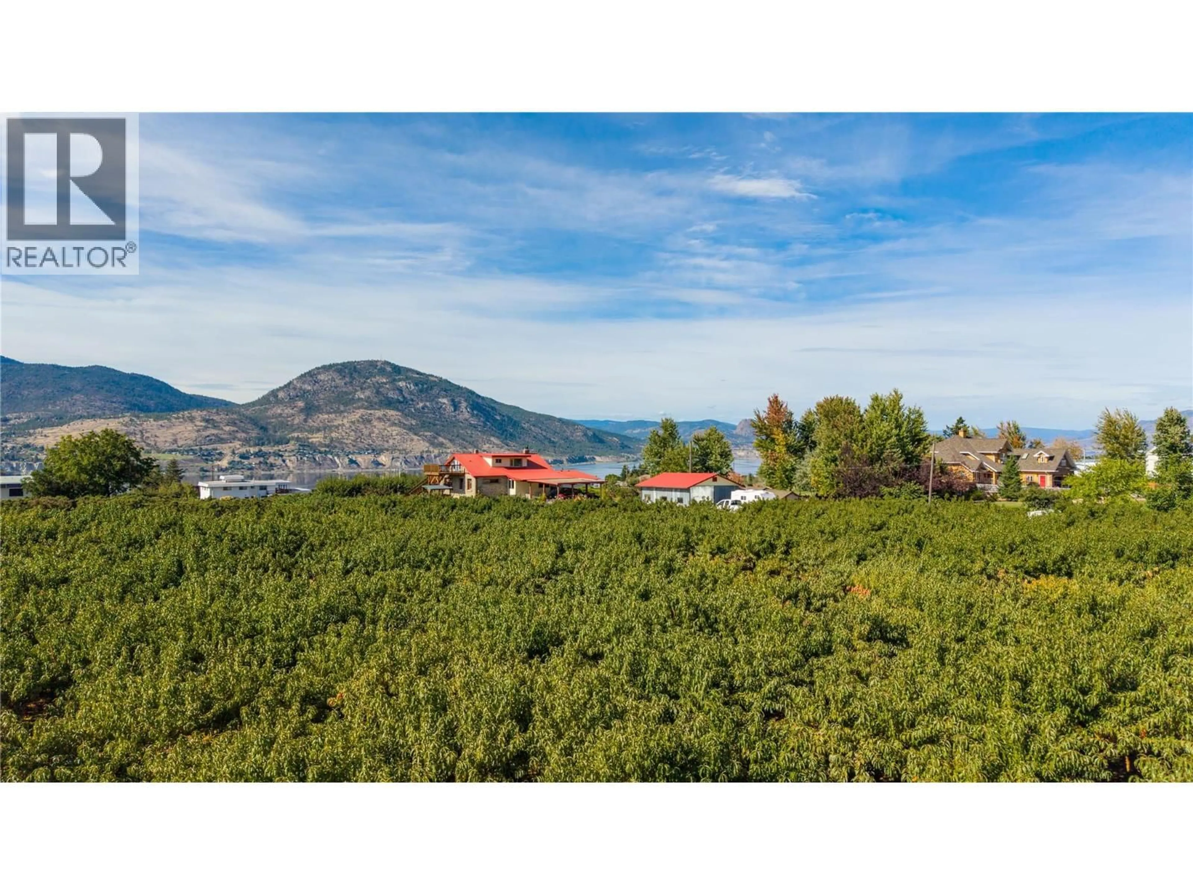A pic from outside/outdoor area/front of a property/back of a property/a pic from drone, mountain view for 235 MIDDLE BENCH ROAD NORTH, Penticton British Columbia V2A8S5
