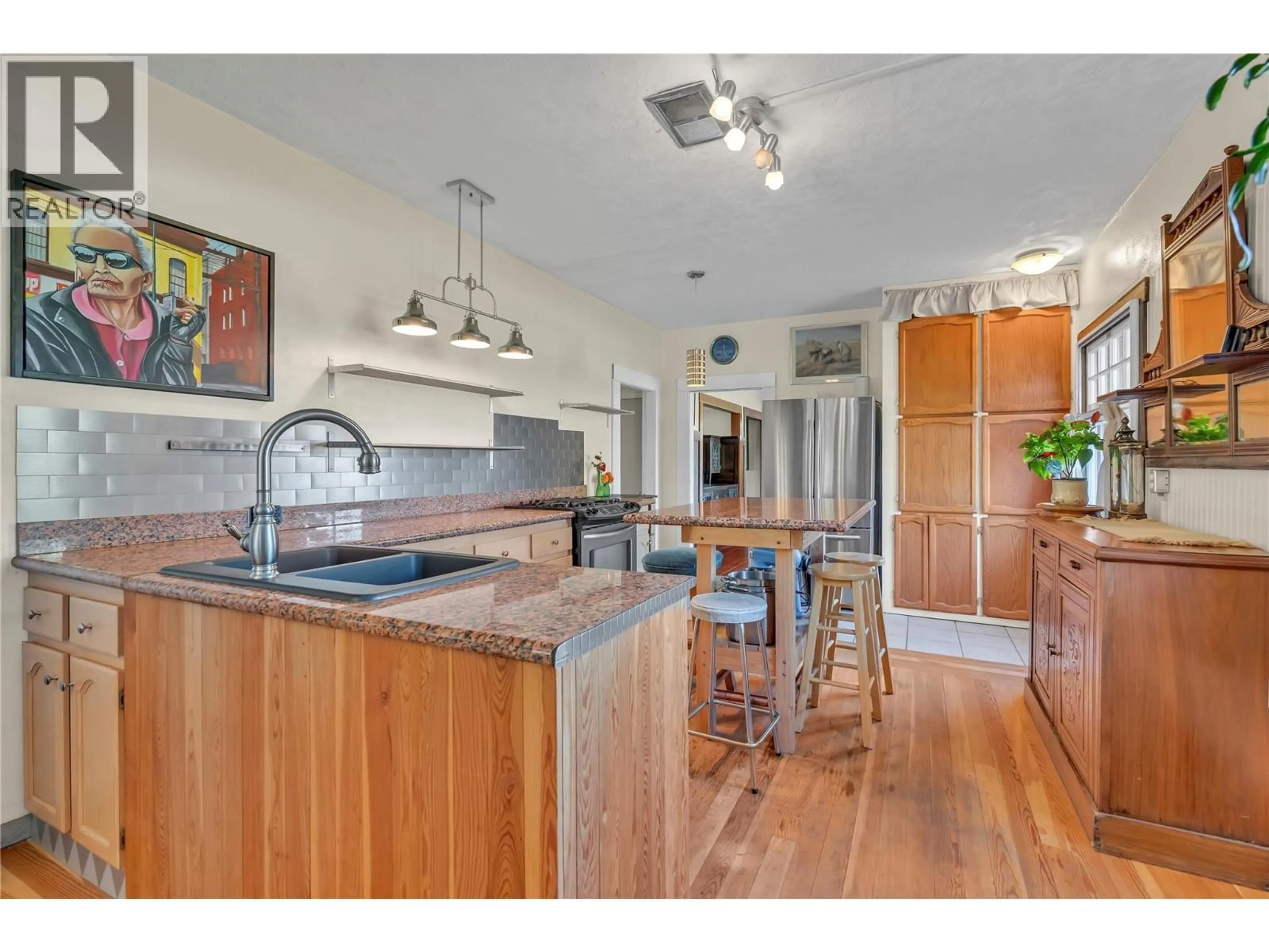Open concept kitchen, ceramic/tile floor for 235 MIDDLE BENCH ROAD NORTH, Penticton British Columbia V2A8S5