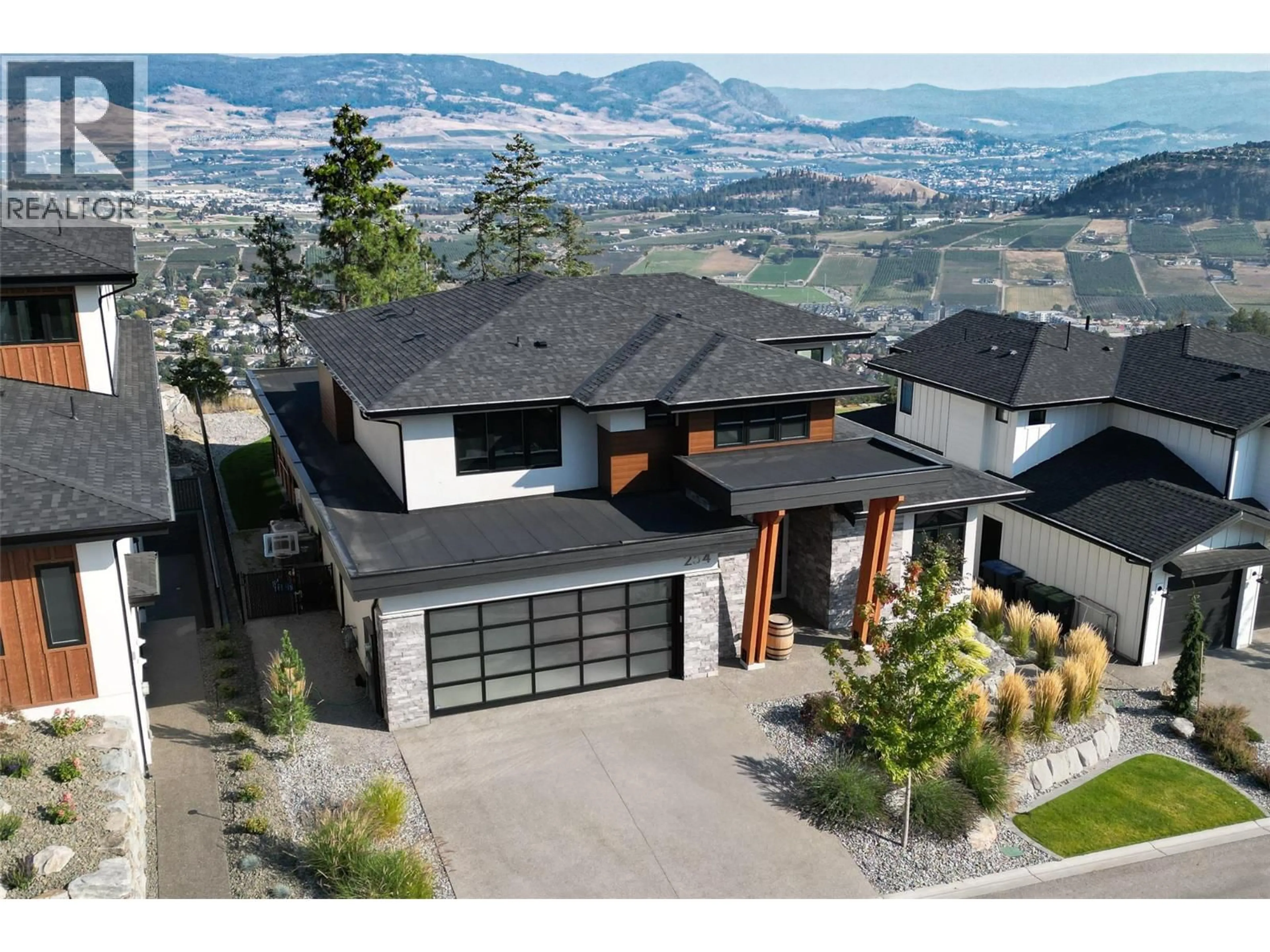 Home with vinyl exterior material, mountain view for 254 SUMMER WOOD DRIVE, Kelowna British Columbia V1V0C9