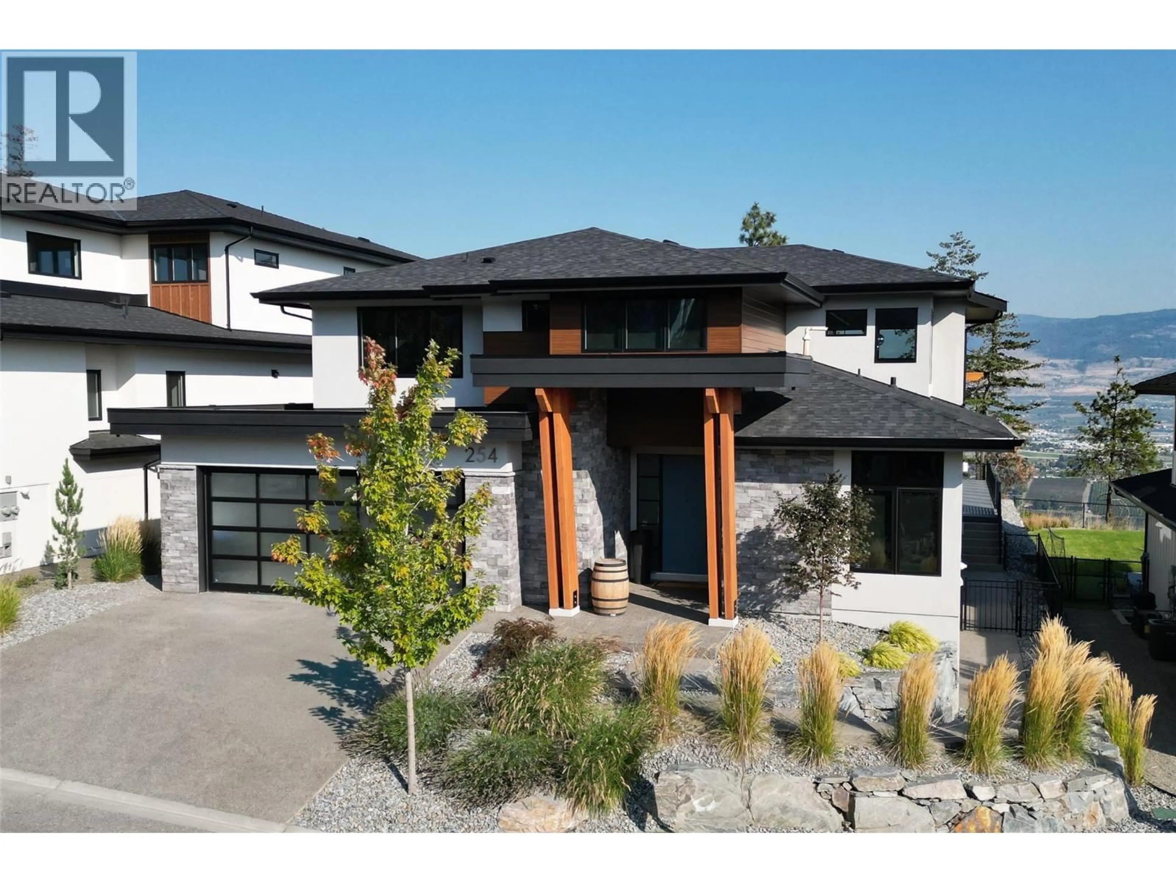 Home with brick exterior material, street for 254 SUMMER WOOD DRIVE, Kelowna British Columbia V1V0C9