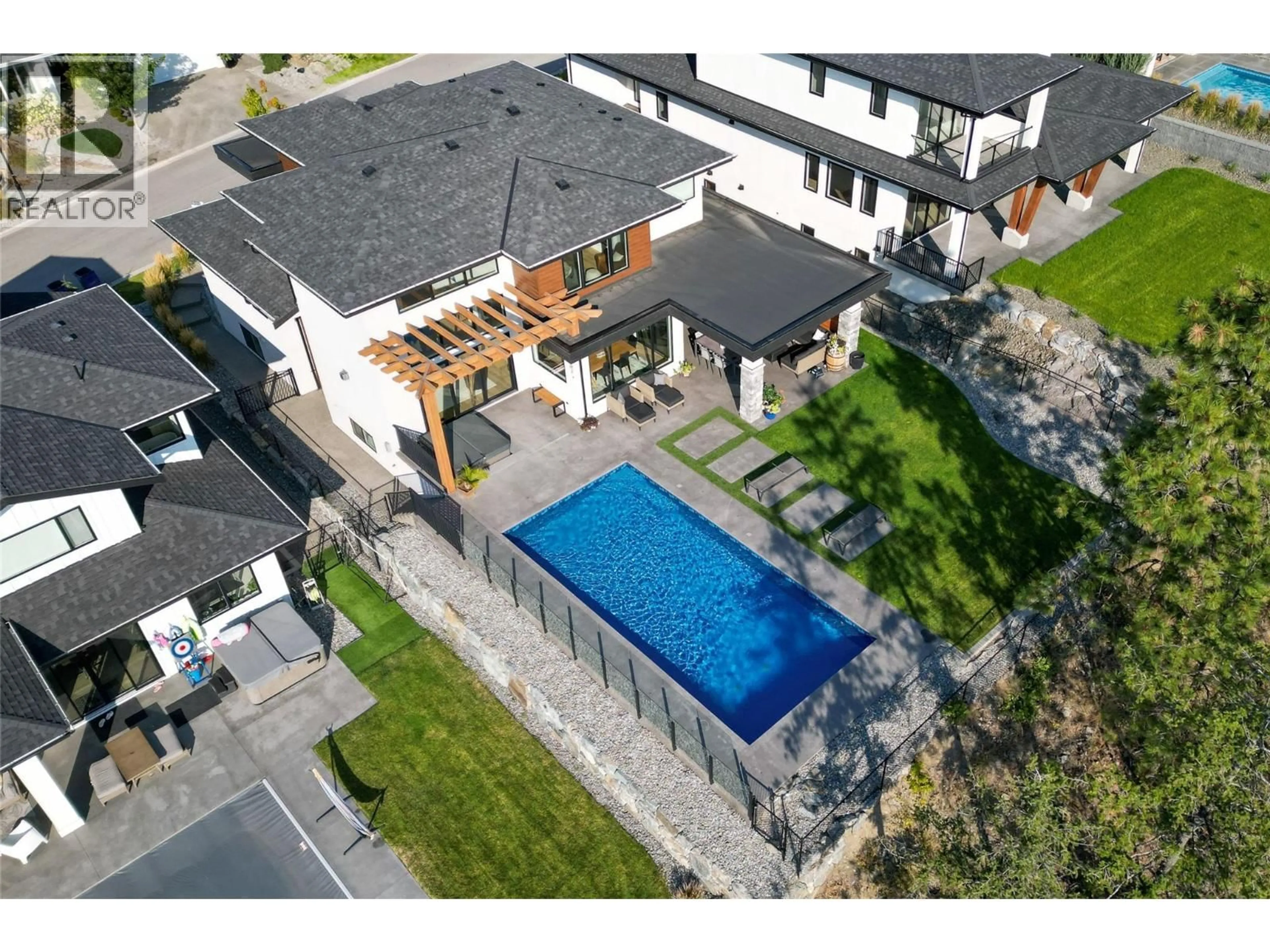 A pic from outside/outdoor area/front of a property/back of a property/a pic from drone, street for 254 SUMMER WOOD DRIVE, Kelowna British Columbia V1V0C9
