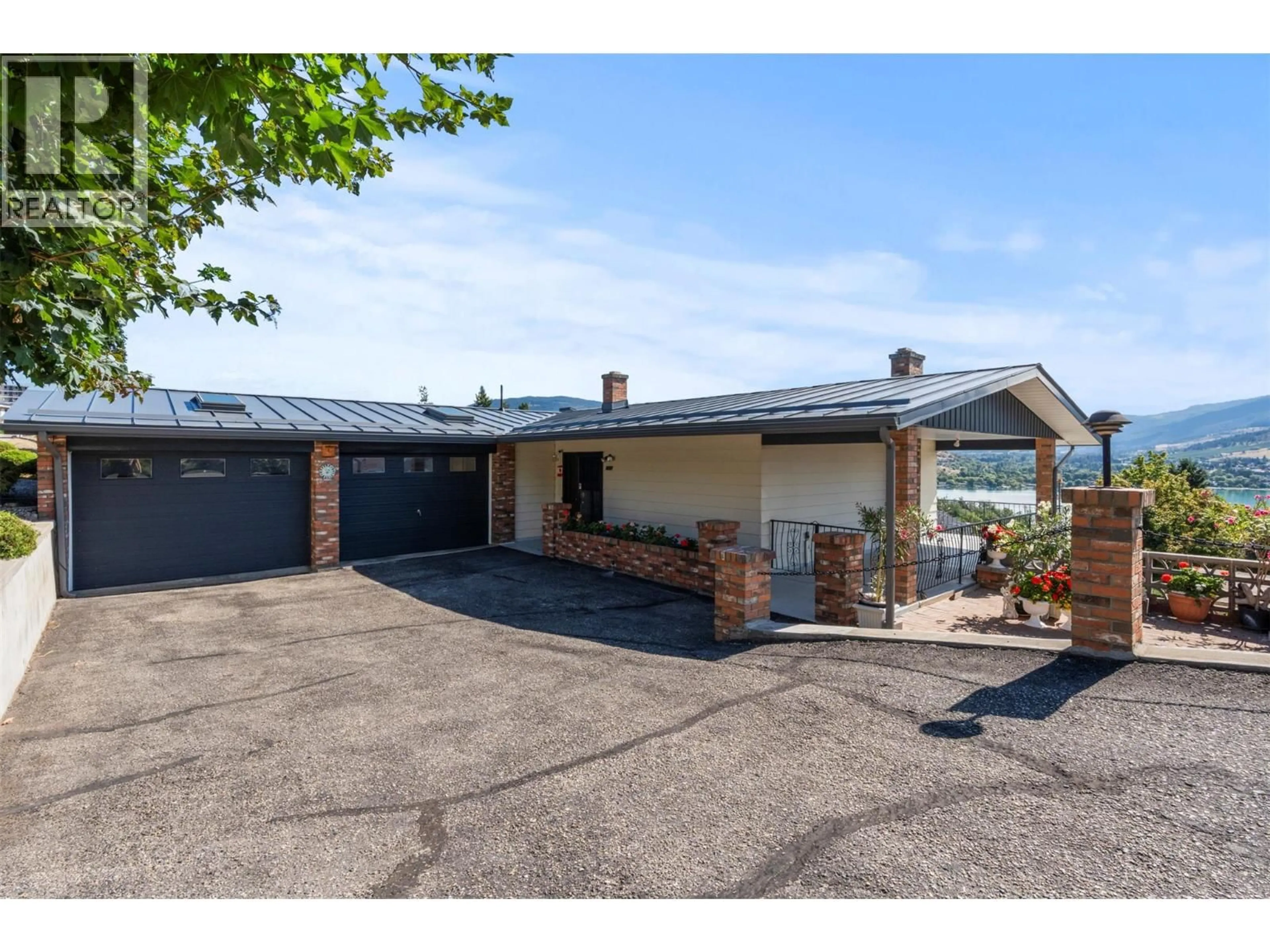 A pic from outside/outdoor area/front of a property/back of a property/a pic from drone, unknown for 8804 FITZMAURICE LANE, Vernon British Columbia V1B1X4