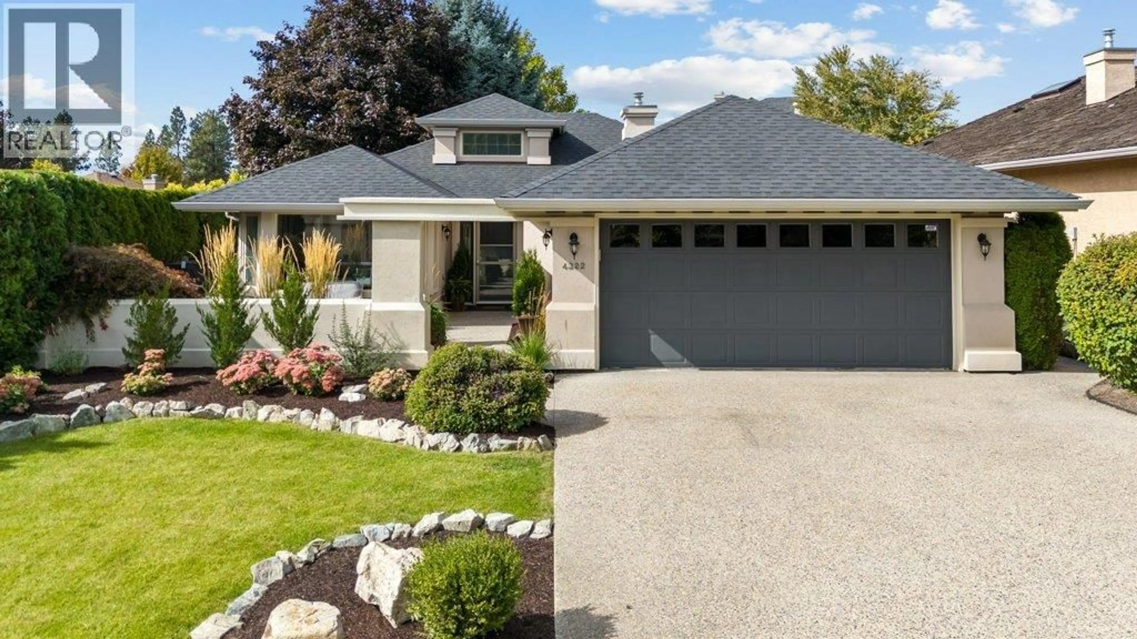 Home with vinyl exterior material, street for 4222 GALLAGHERS CRESCENT, Kelowna British Columbia V1W3Z9