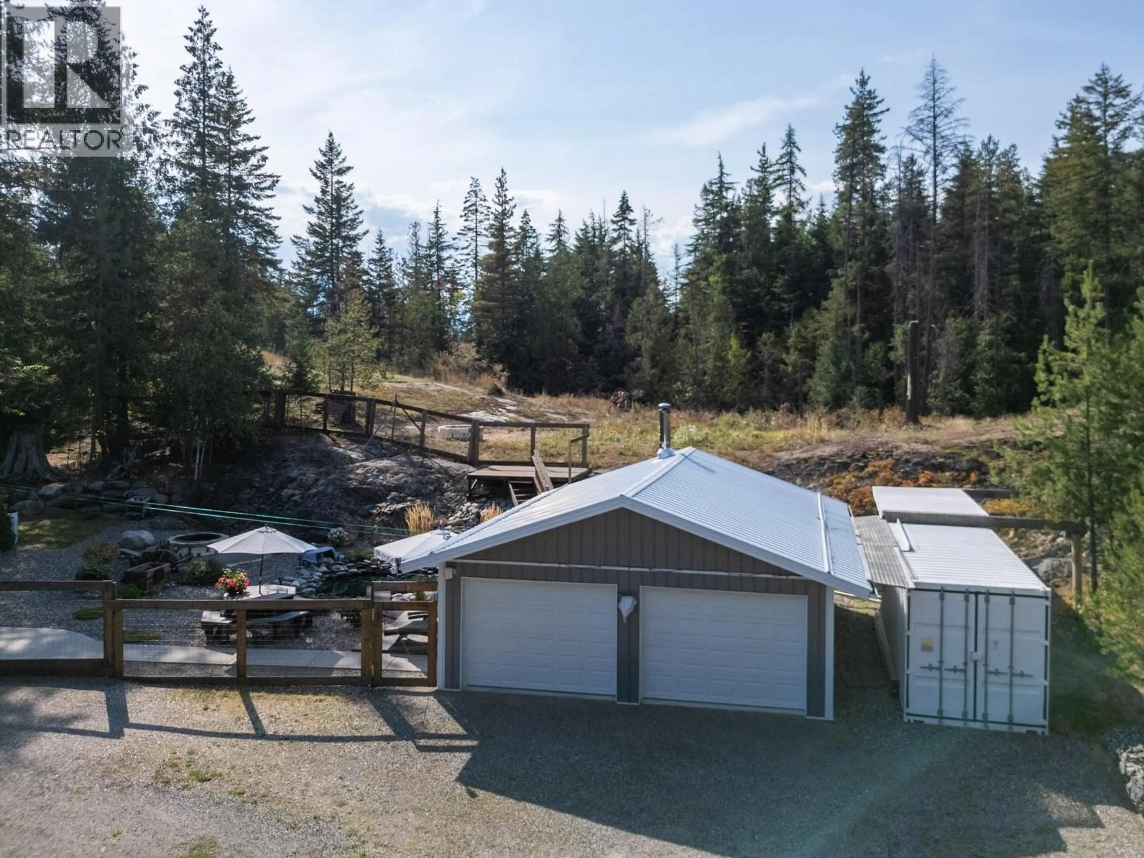 A pic from outside/outdoor area/front of a property/back of a property/a pic from drone, forest/trees view for 602 LAKEVIEW ARROW CREEK ROAD, Arrow Creek British Columbia V0B1G8