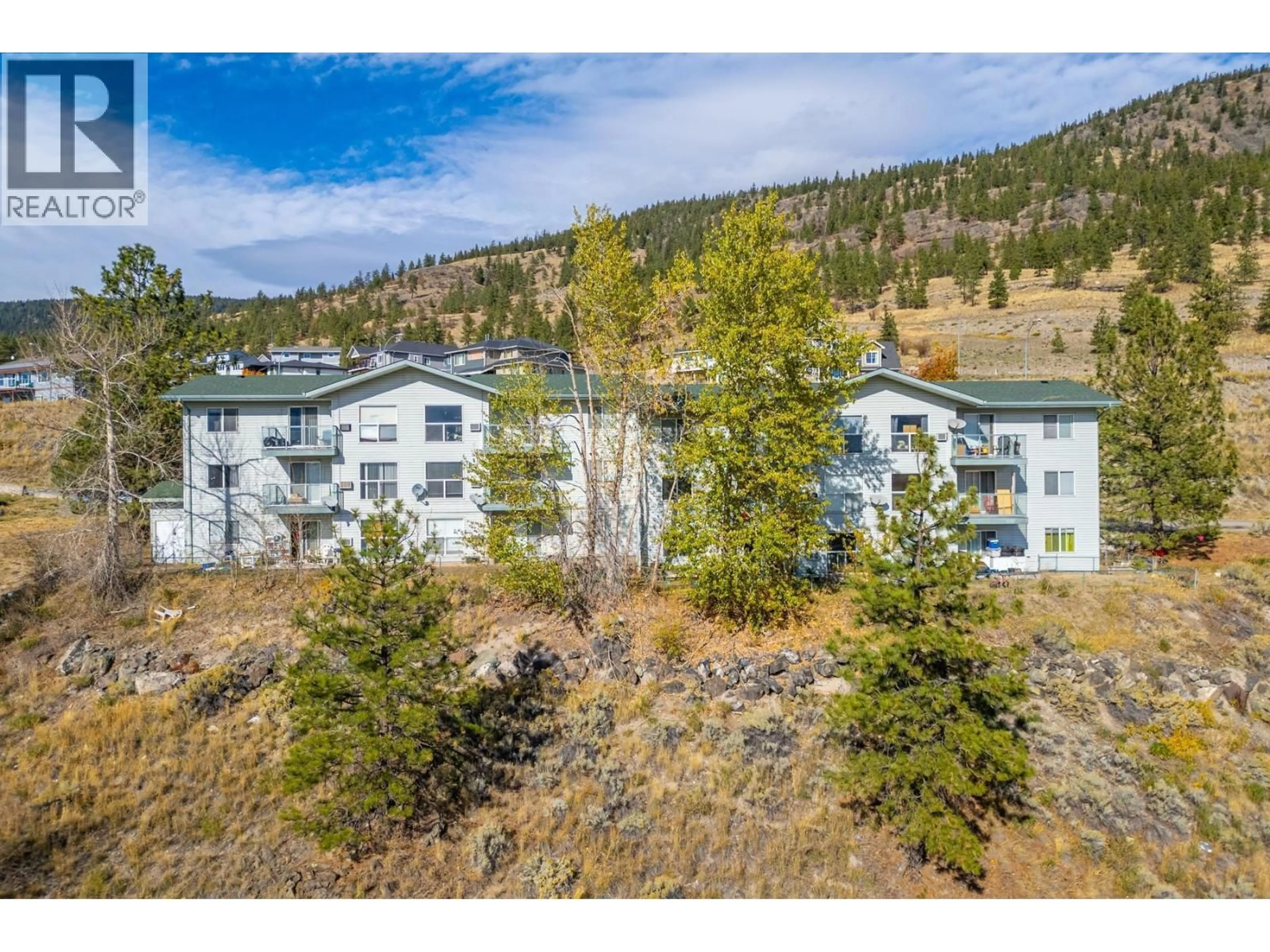 A pic from outside/outdoor area/front of a property/back of a property/a pic from drone, mountain view for 102 - 2802 GRANDVIEW HEIGHTS ROAD, Merritt British Columbia V1K1P9
