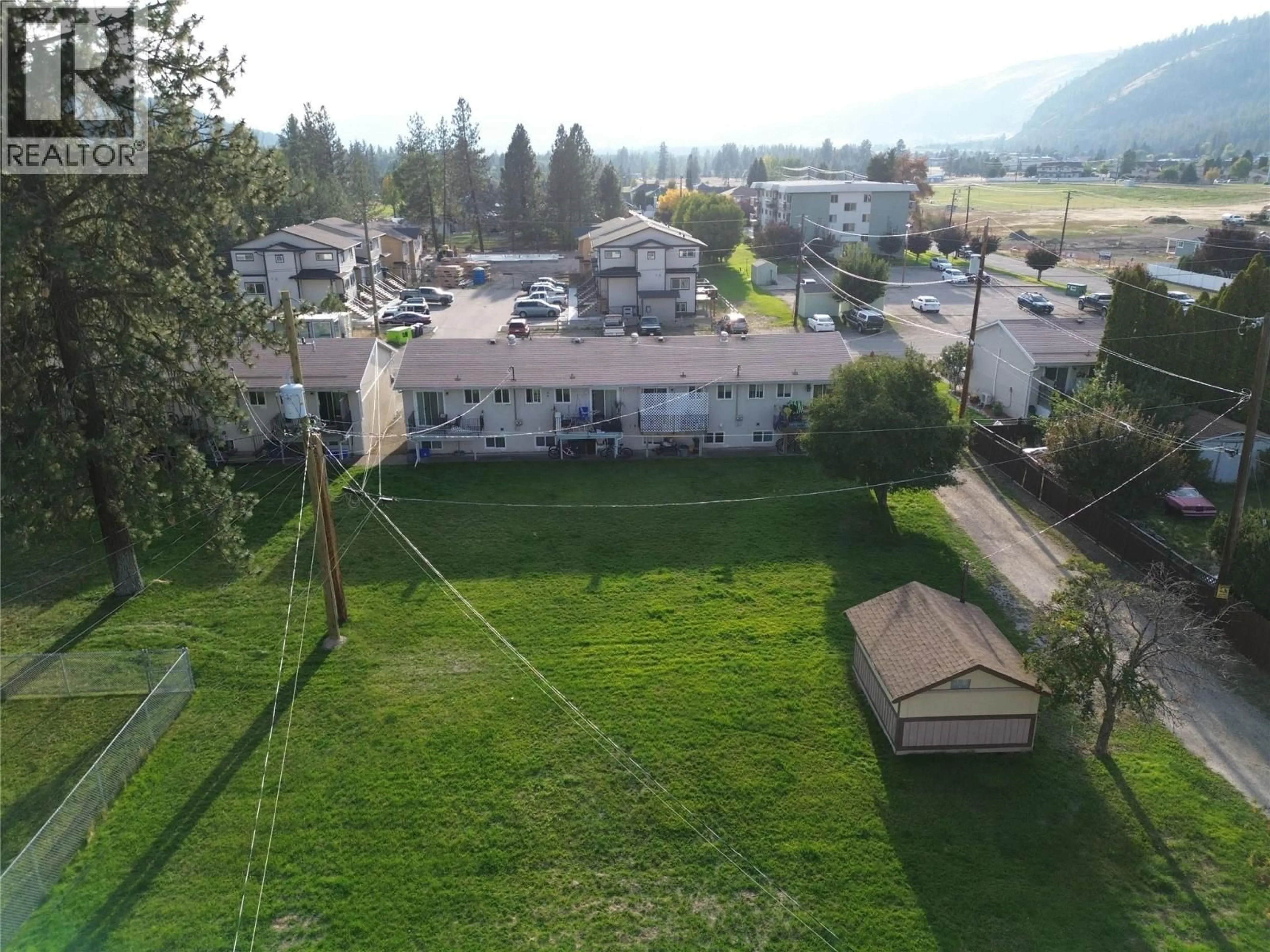 A pic from outside/outdoor area/front of a property/back of a property/a pic from drone, mountain view for 2 - 6730 21ST STREET, Grand Forks British Columbia V0H1H0