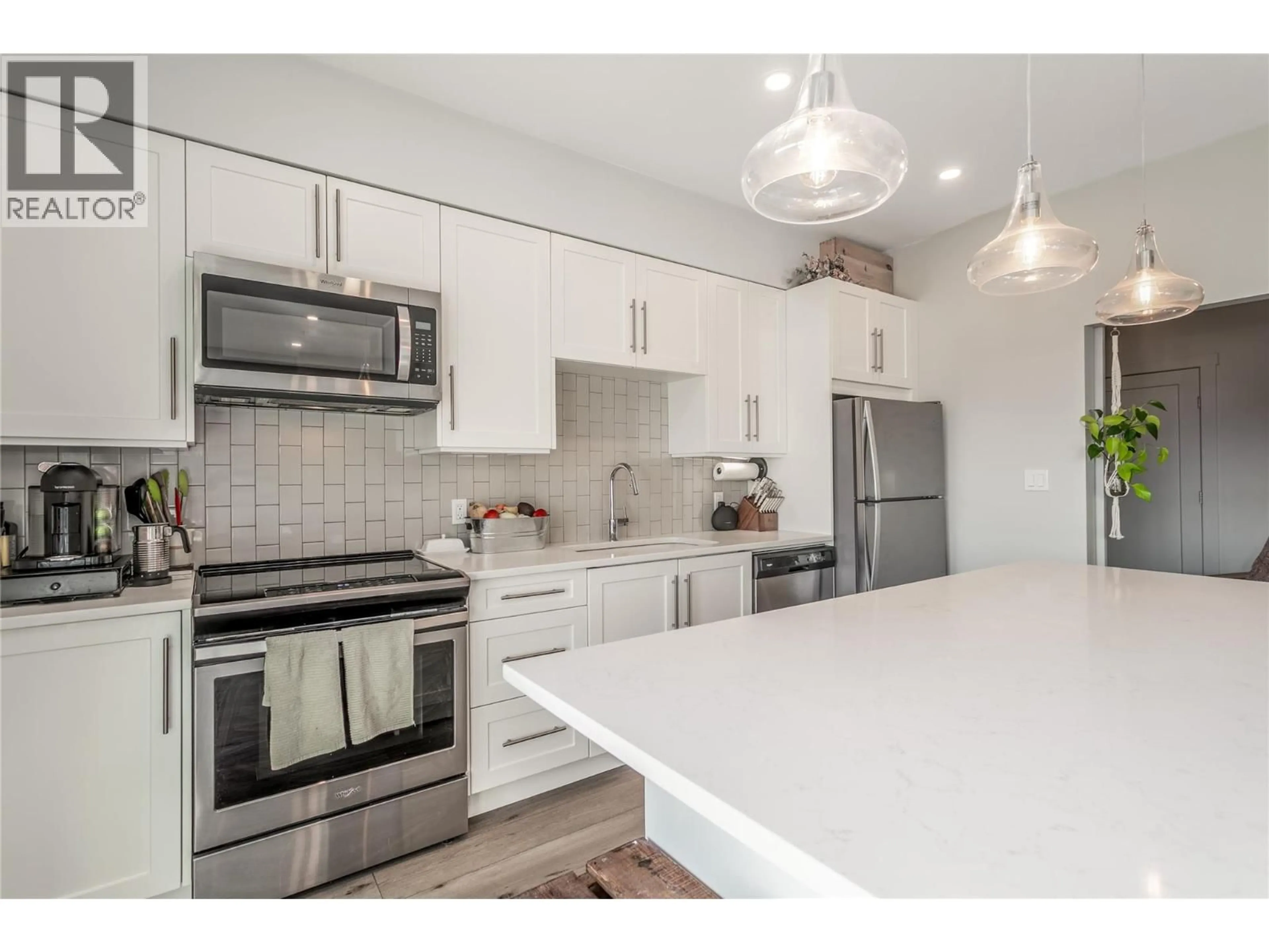 Open concept kitchen, unknown for 403 - 3630 MISSION SPRINGS DRIVE, Kelowna British Columbia V1W0B2