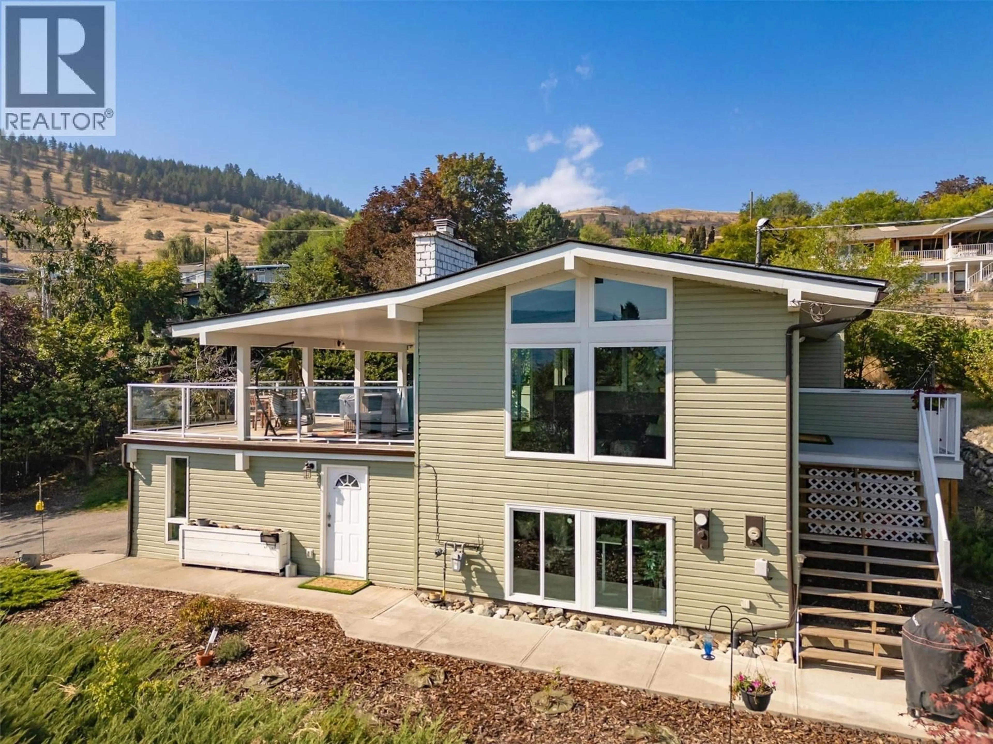 Home with vinyl exterior material, mountain view for 8204 KALVIEW DRIVE, Coldstream British Columbia V1B1W7
