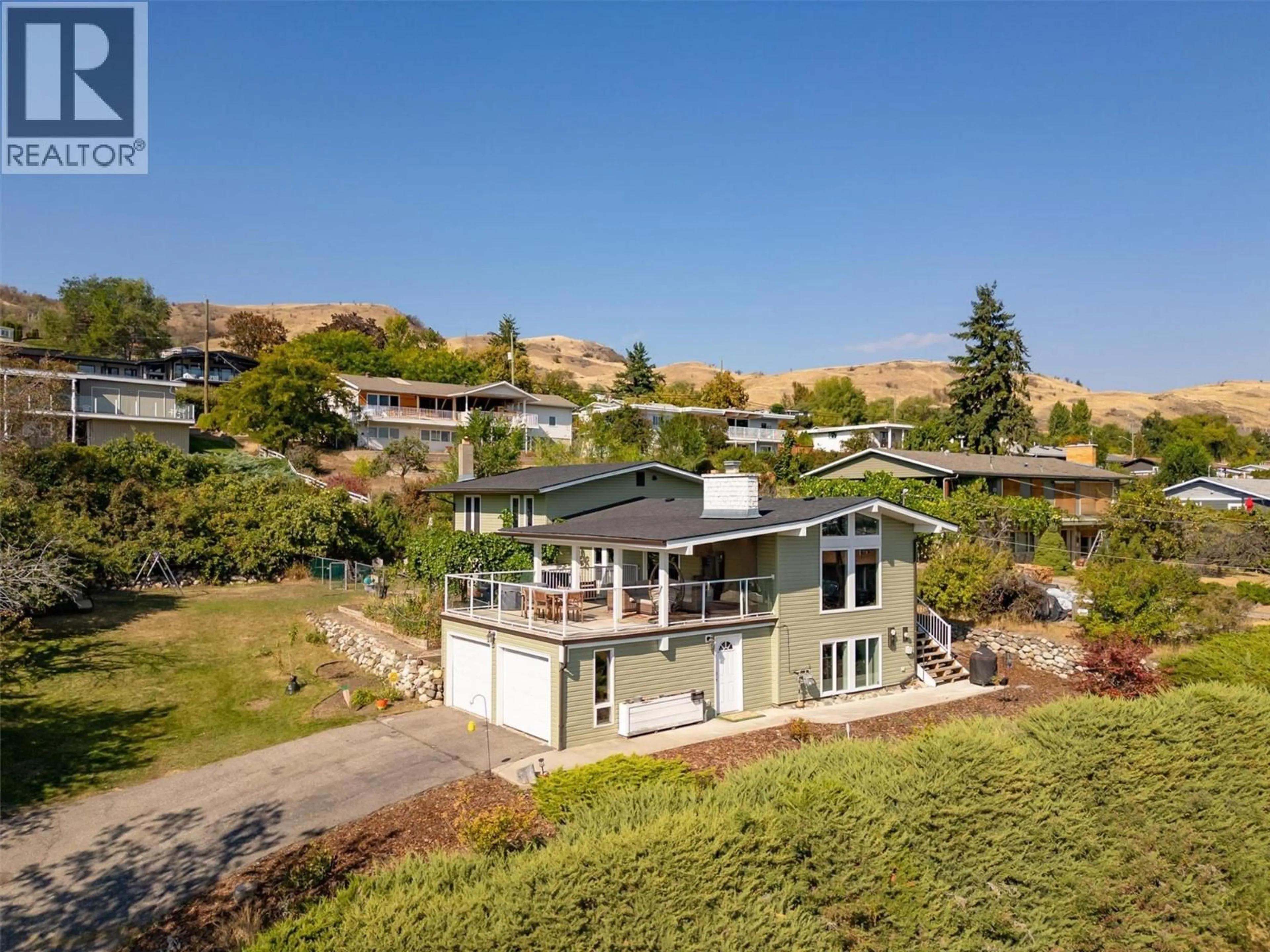 A pic from outside/outdoor area/front of a property/back of a property/a pic from drone, water/lake/river/ocean view for 8204 KALVIEW DRIVE, Coldstream British Columbia V1B1W7