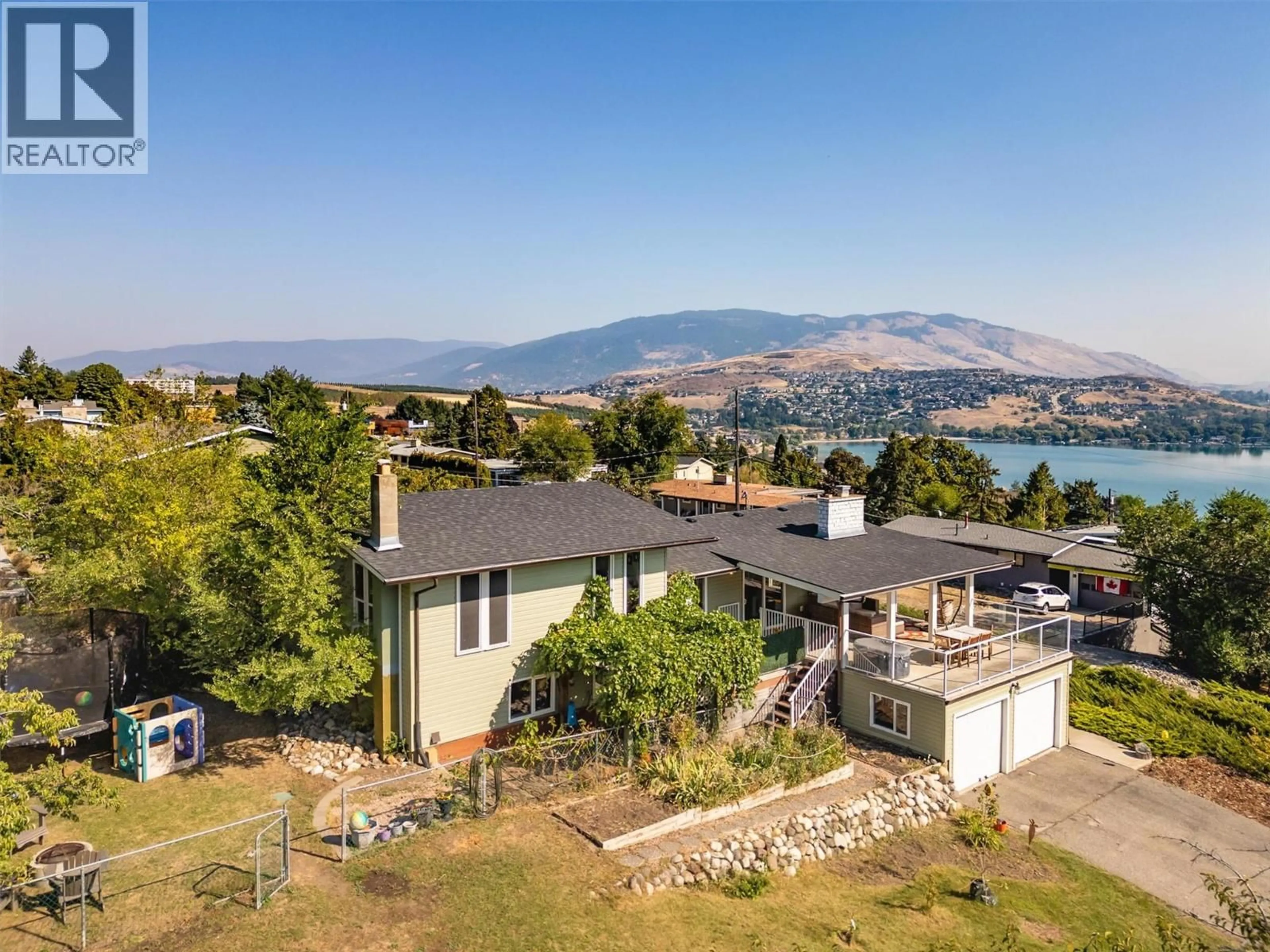 A pic from outside/outdoor area/front of a property/back of a property/a pic from drone, water/lake/river/ocean view for 8204 KALVIEW DRIVE, Coldstream British Columbia V1B1W7