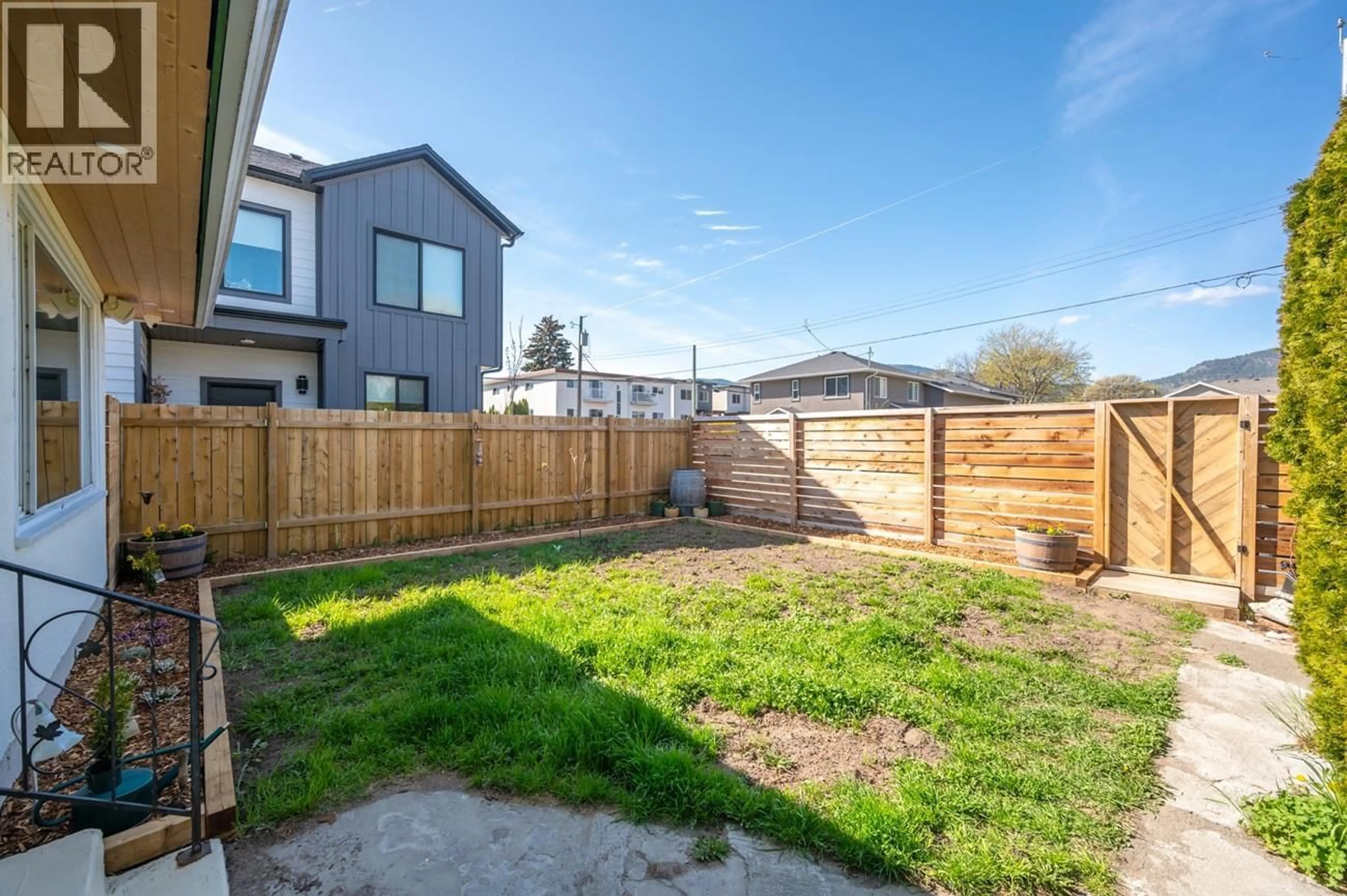 A pic from outside/outdoor area/front of a property/back of a property/a pic from drone, street for 282 BASSETT STREET, Penticton British Columbia V2A5W3