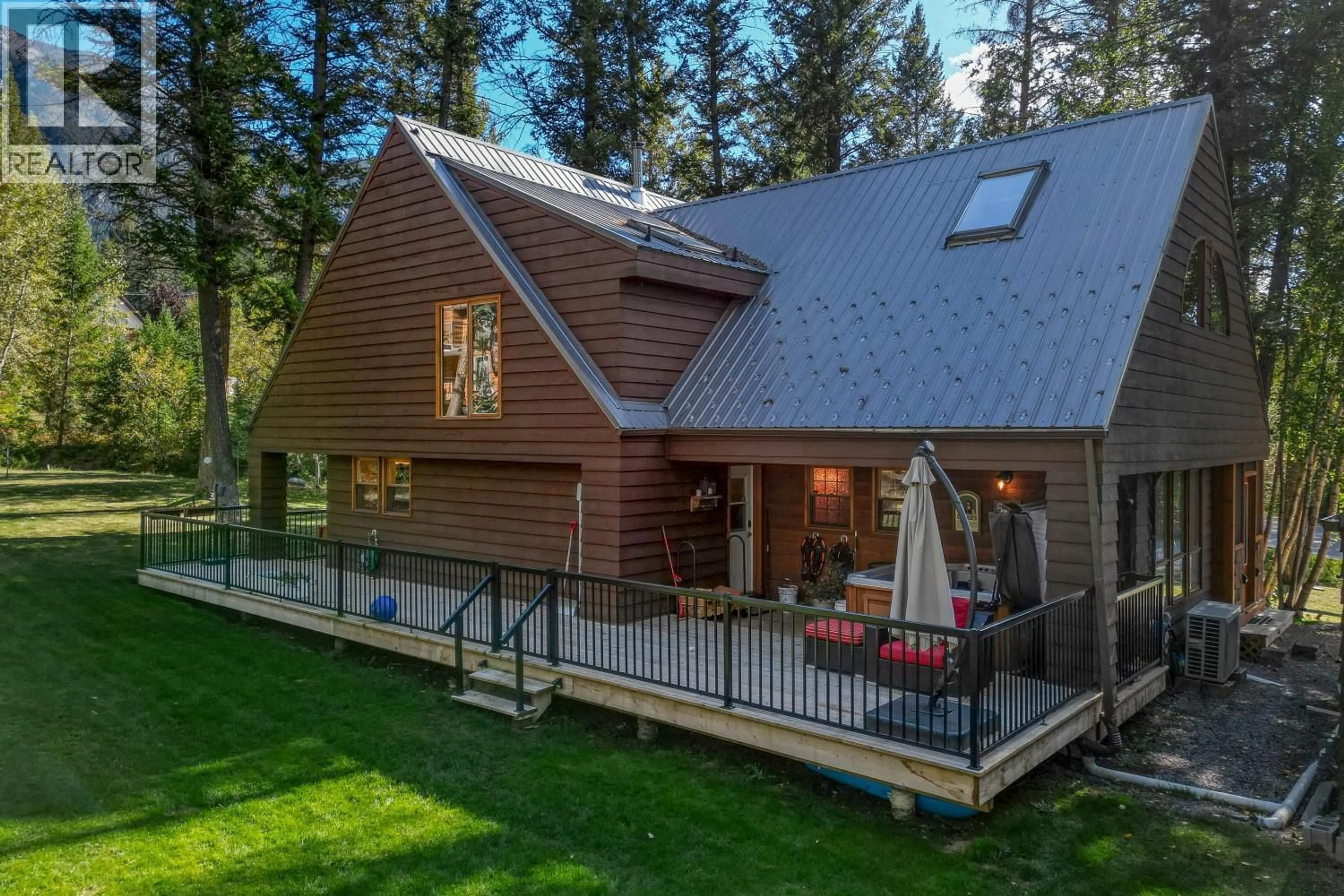 Home with vinyl exterior material, unknown for 4891 FAIRMONT CREEK ROAD, Fairmont Hot Springs British Columbia V0B1L1