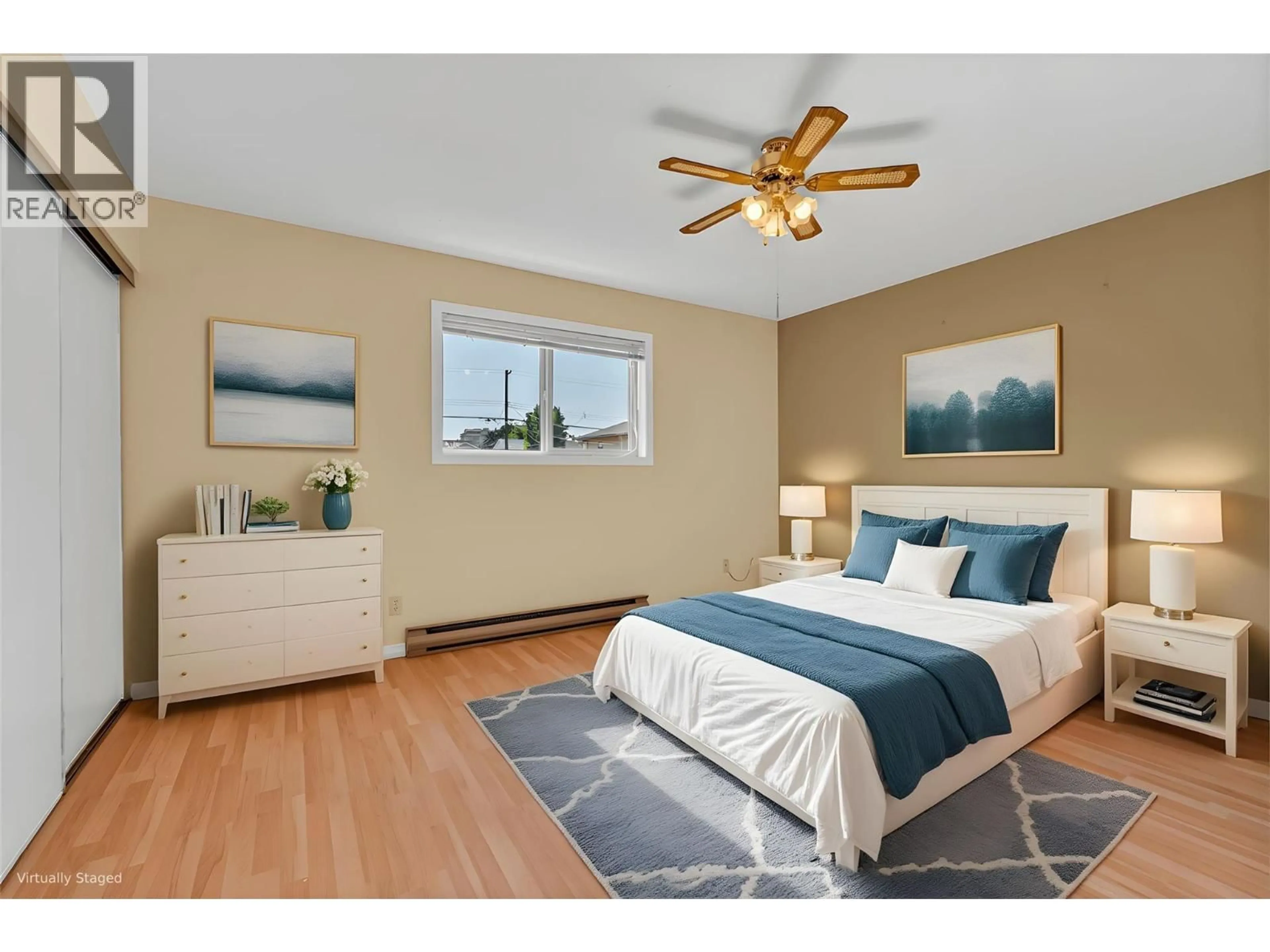Bedroom with bed, wood/laminate floor for 106 - 1860 ATKINSON STREET STREET, Penticton British Columbia V2A7M6