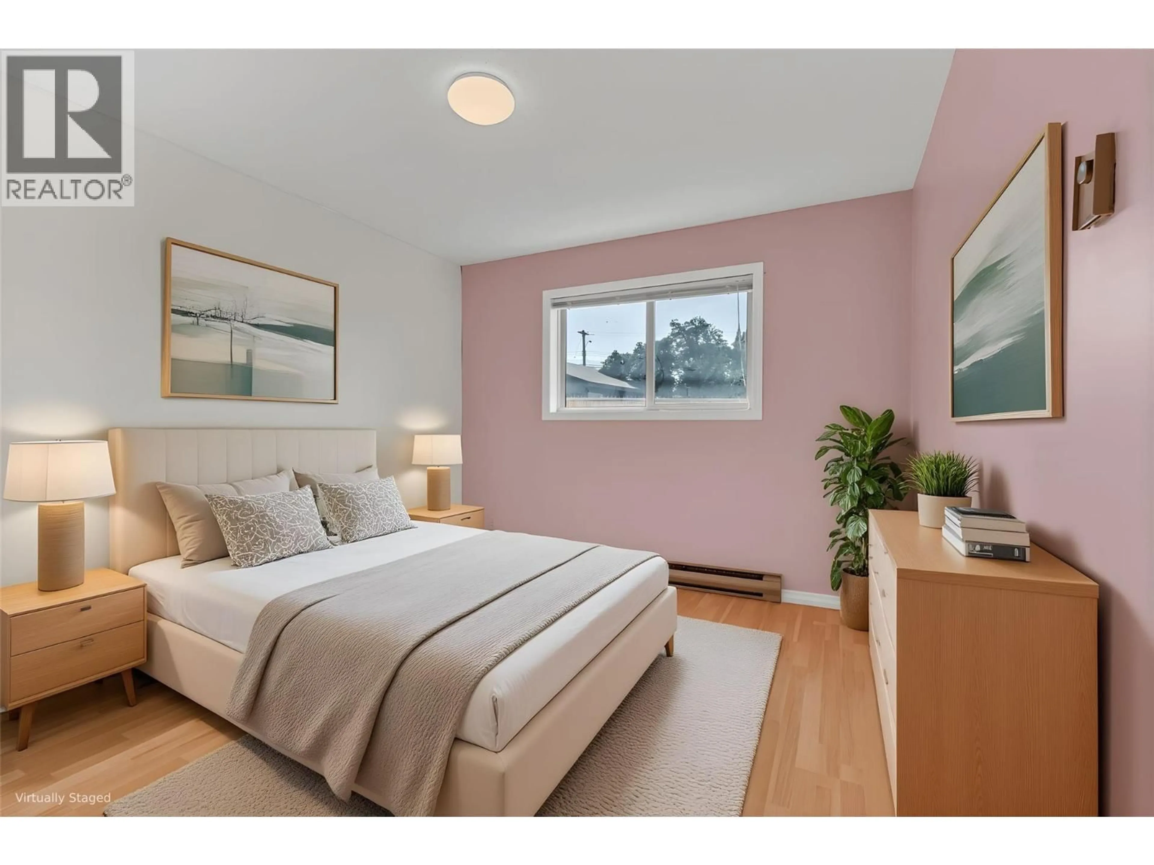 Bedroom with bed, wood/laminate floor for 106 - 1860 ATKINSON STREET STREET, Penticton British Columbia V2A7M6