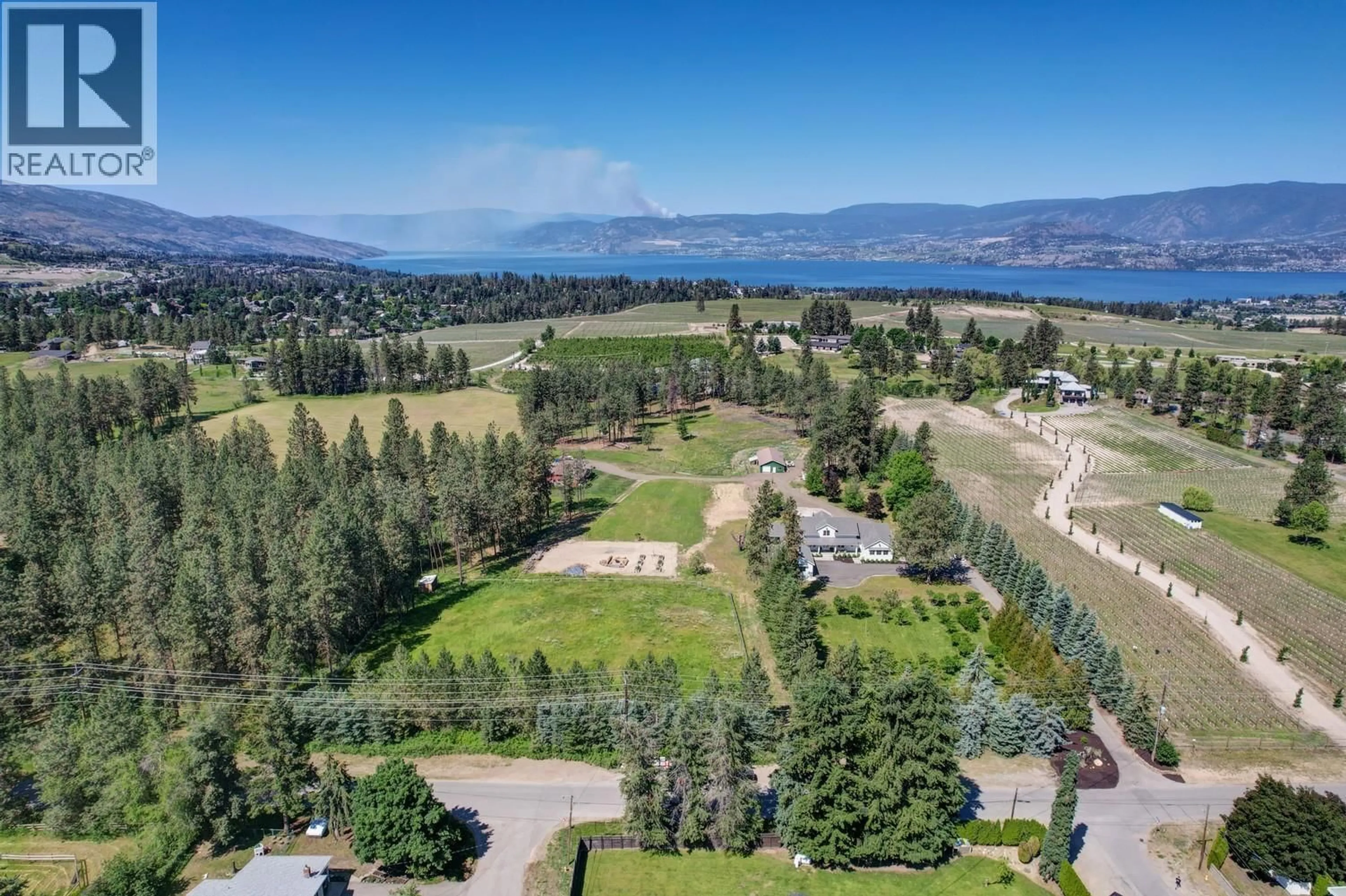 A pic from outside/outdoor area/front of a property/back of a property/a pic from drone, water/lake/river/ocean view for 4510-4520 STEWART ROAD EAST, Kelowna British Columbia V1W4C1