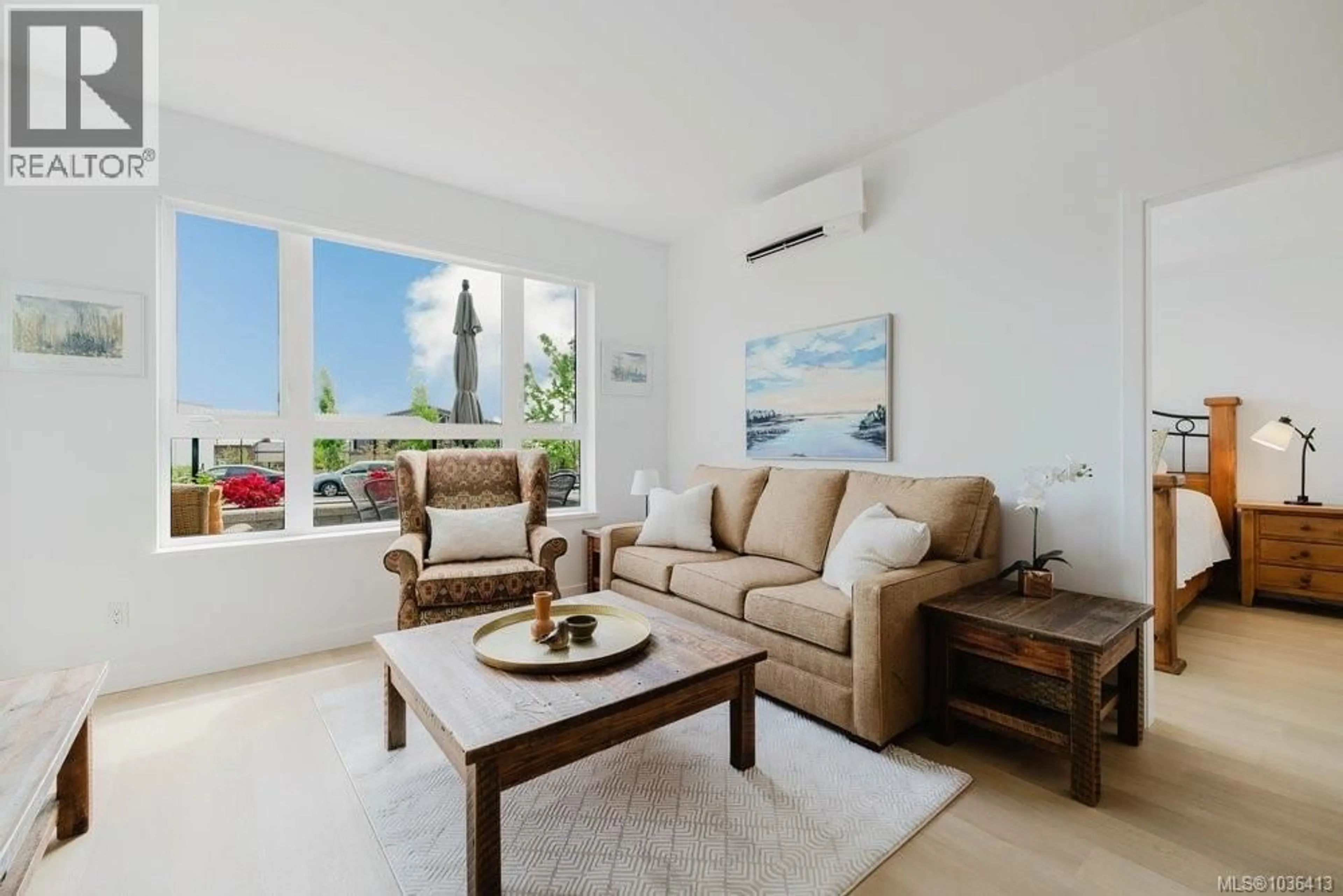 Living room with furniture, unknown for 111 - 3564 A RYDER HESJEDAL WAY, Colwood British Columbia V9C0V3