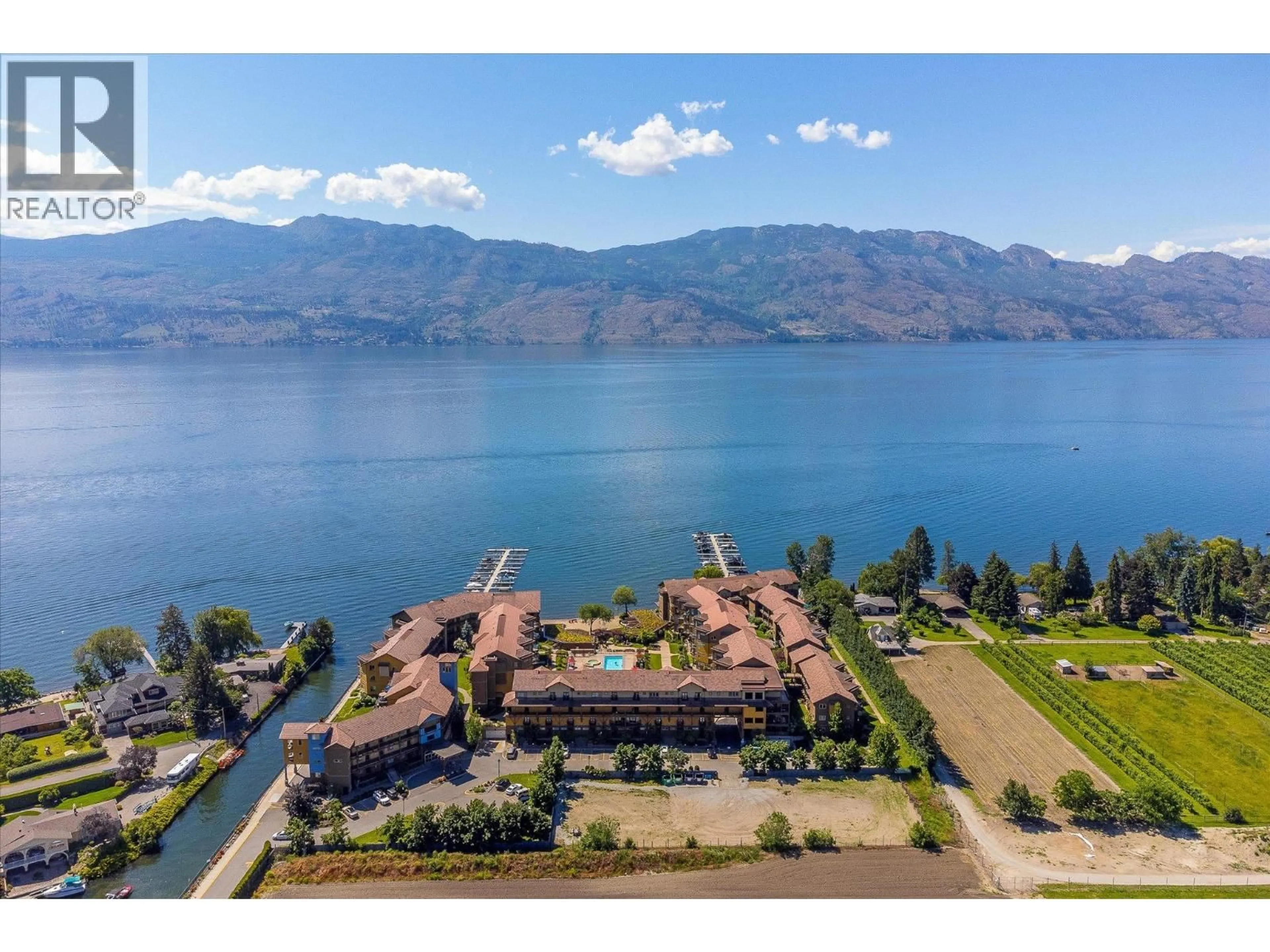 A pic from outside/outdoor area/front of a property/back of a property/a pic from drone, water/lake/river/ocean view for 5403 - 4034 PRITCHARD DRIVE, West Kelowna British Columbia V4T3E4