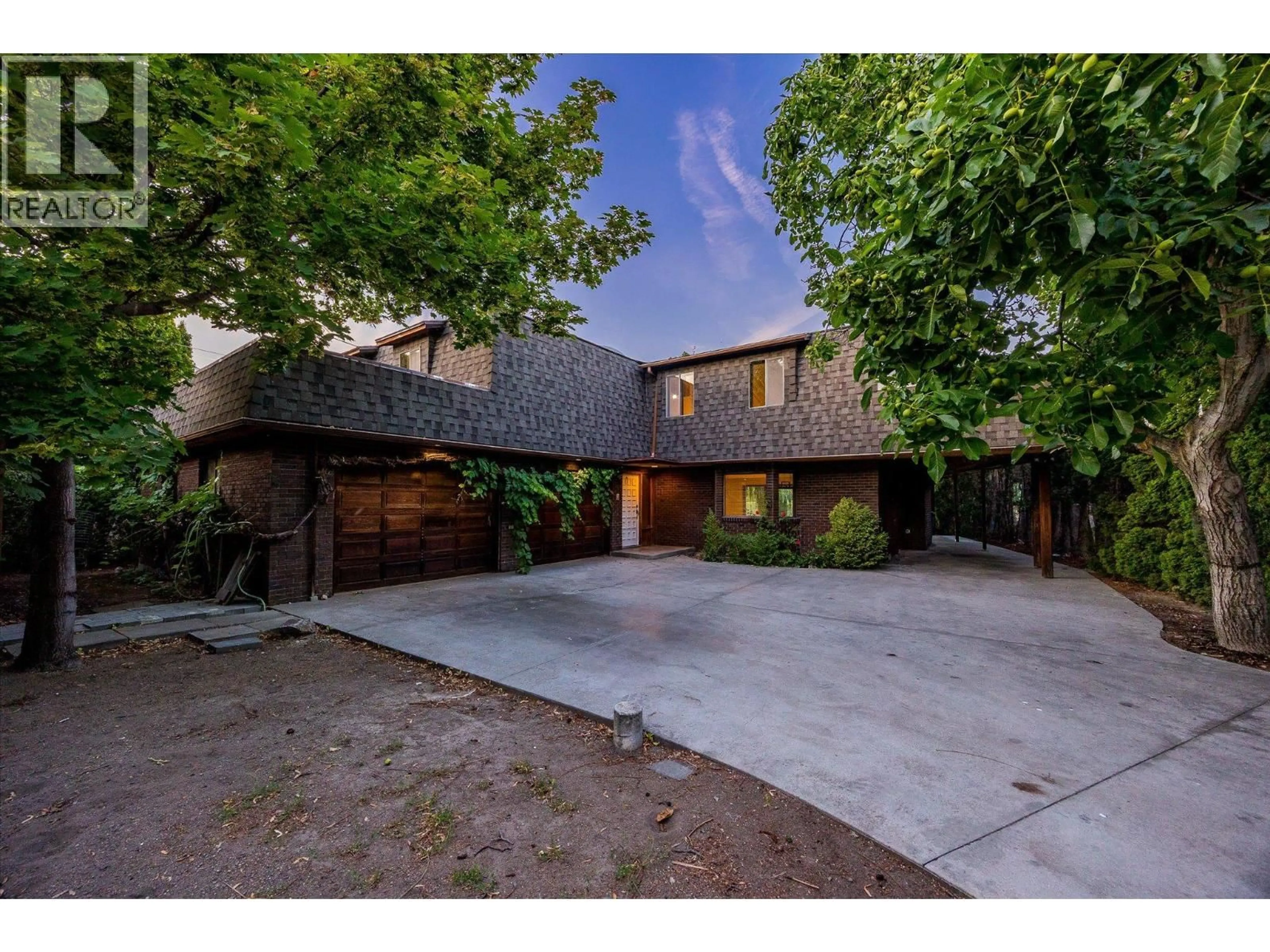 A pic from outside/outdoor area/front of a property/back of a property/a pic from drone, street for 1440 GREEN BAY ROAD, West Kelowna British Columbia V4T2B8