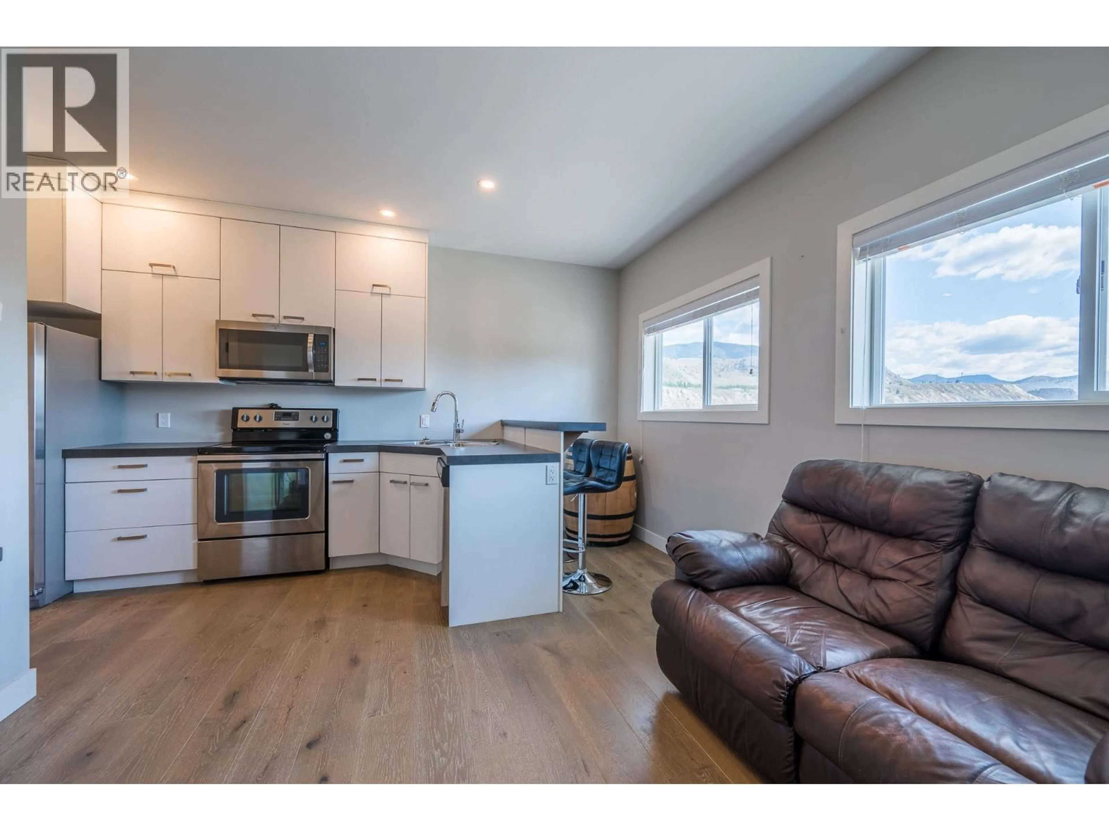 Open concept kitchen, wood/laminate floor for 521 - 5170 DALLAS DRIVE, Kamloops British Columbia V2C0C7
