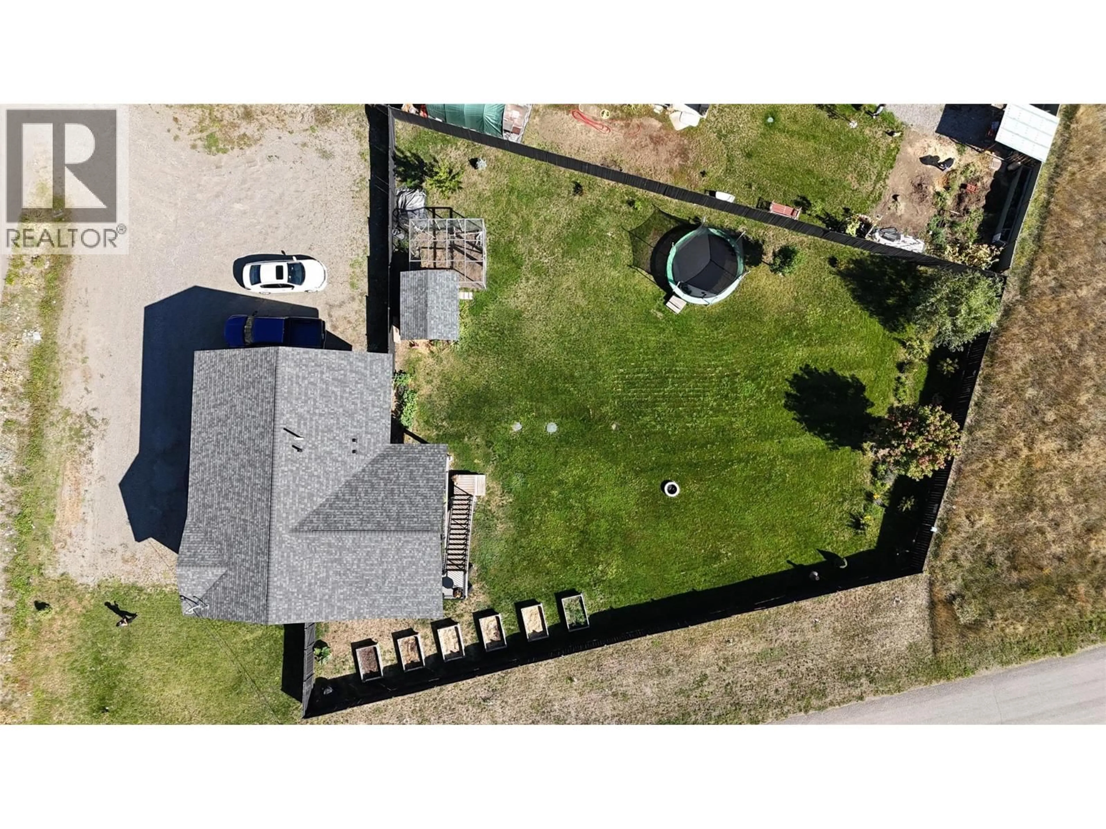 A pic from outside/outdoor area/front of a property/back of a property/a pic from drone, street for 3600 HALL FRONTAGE ROAD, Grand Forks British Columbia V0H1H5