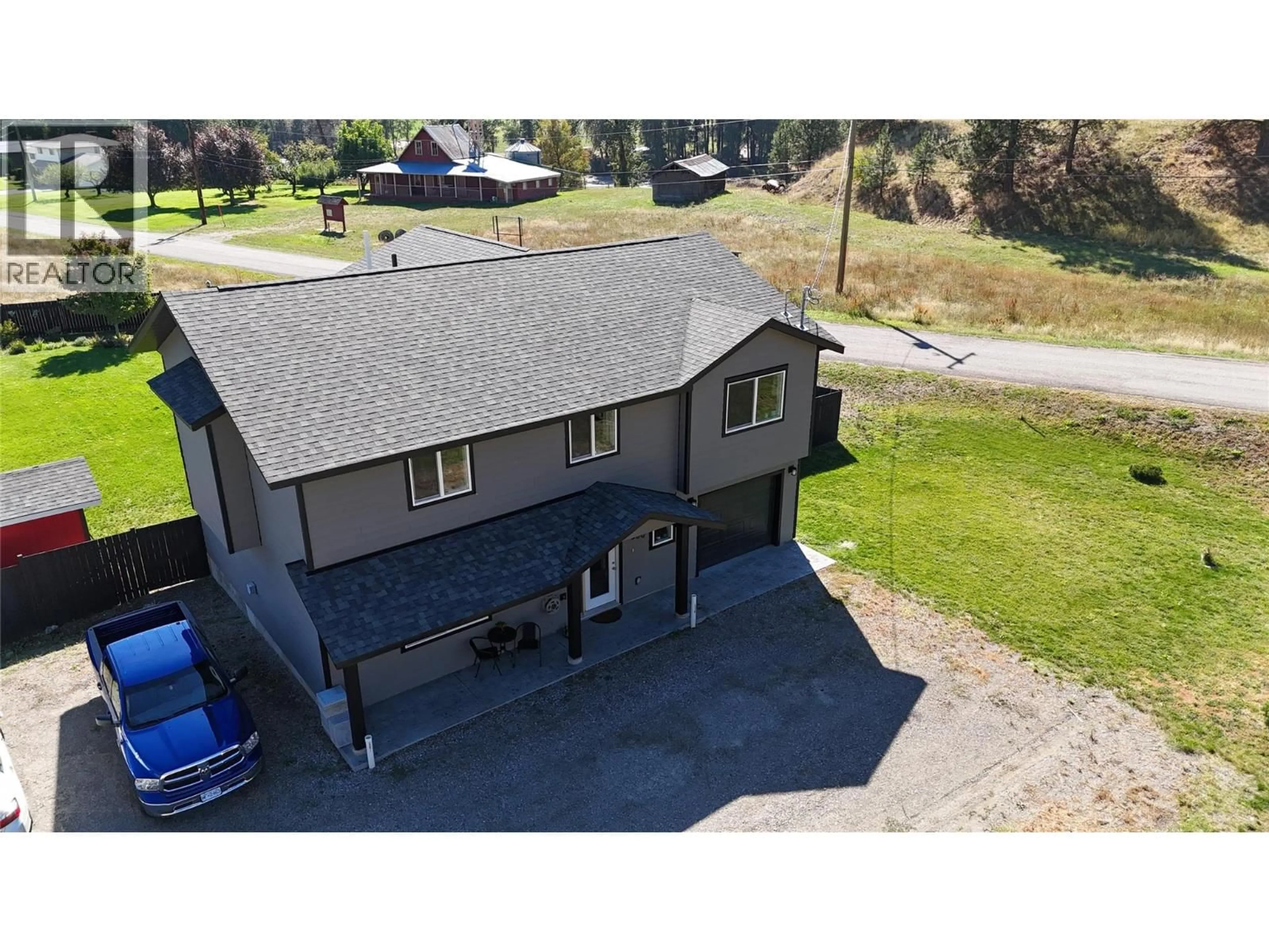 A pic from outside/outdoor area/front of a property/back of a property/a pic from drone, unknown for 3600 HALL FRONTAGE ROAD, Grand Forks British Columbia V0H1H5