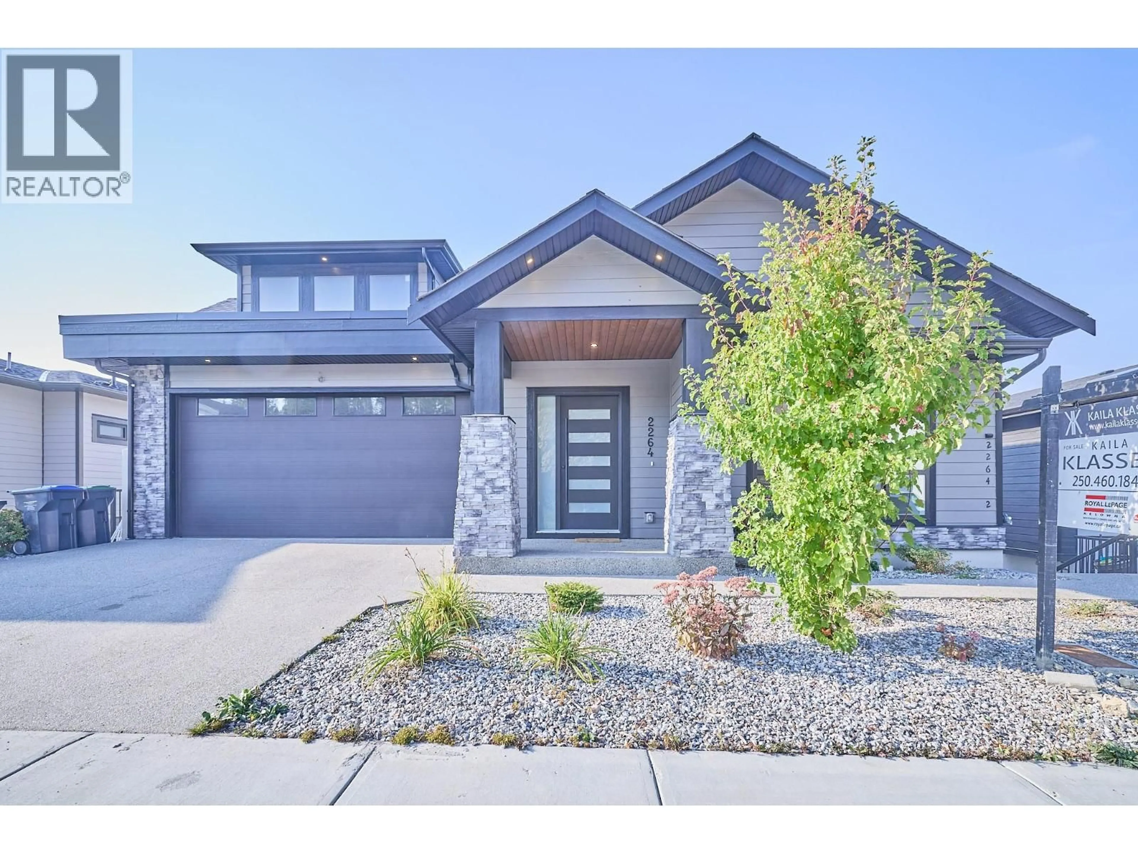 Home with brick exterior material, street for 2264 LAVETTA DRIVE, Kelowna British Columbia V1P1V1