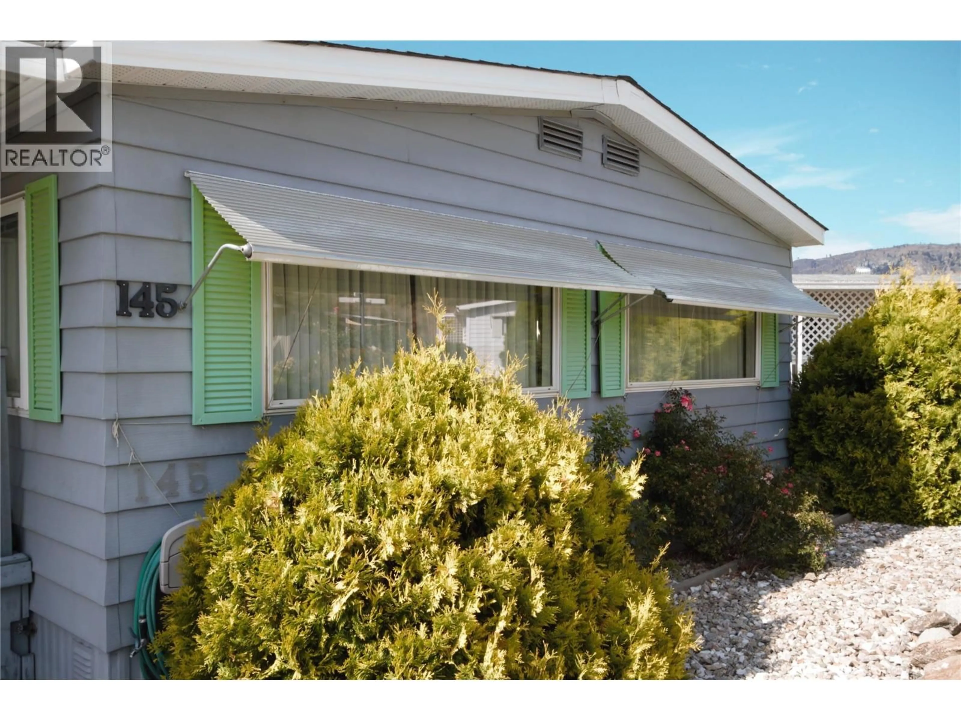 Home with vinyl exterior material, street for 145 6601 TUCELNUIT DRIVE, Oliver British Columbia V0H1T3