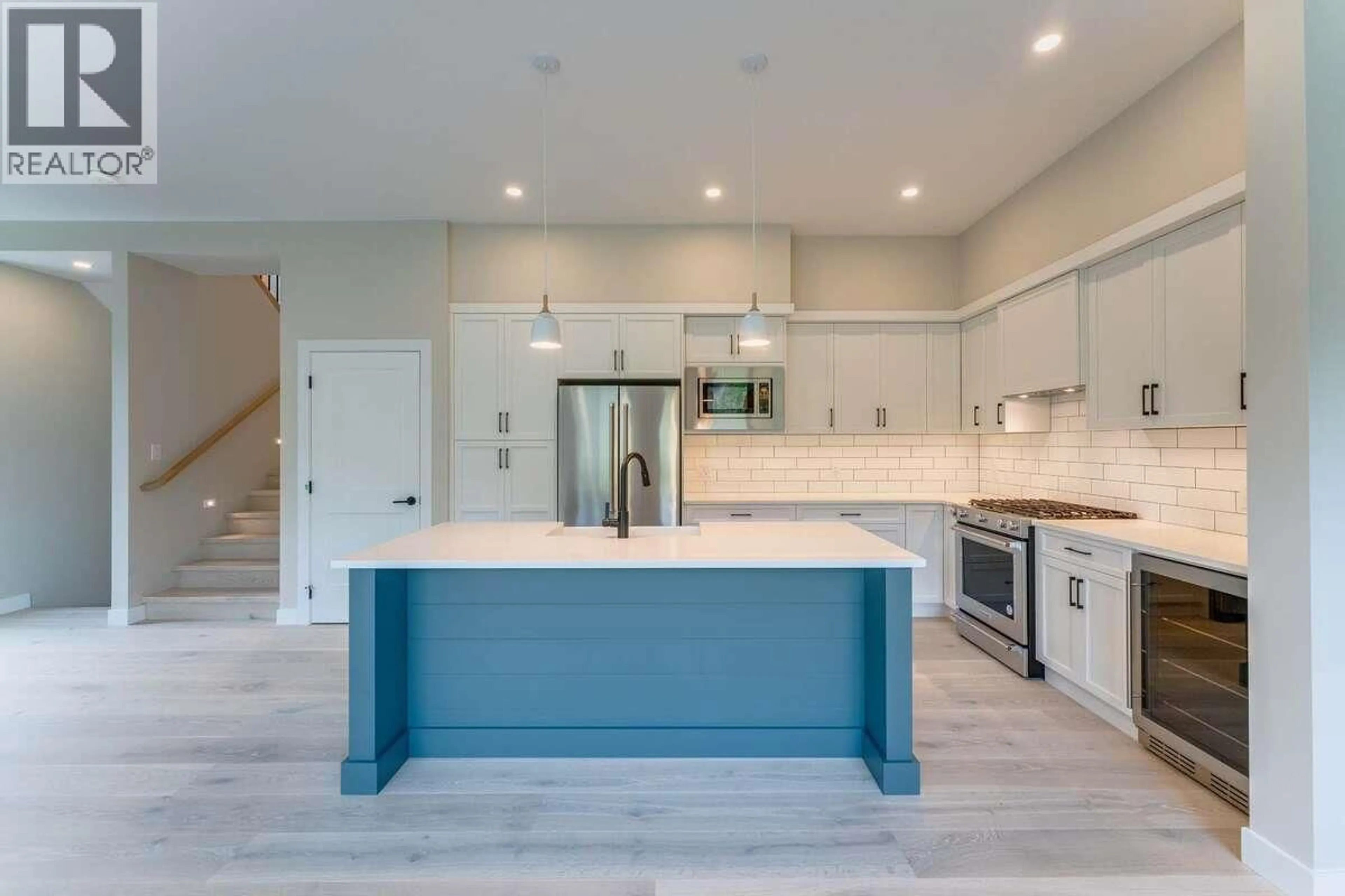 Open concept kitchen, ceramic/tile floor for 47 - 1550 UNION ROAD, Kelowna British Columbia V1V0G9