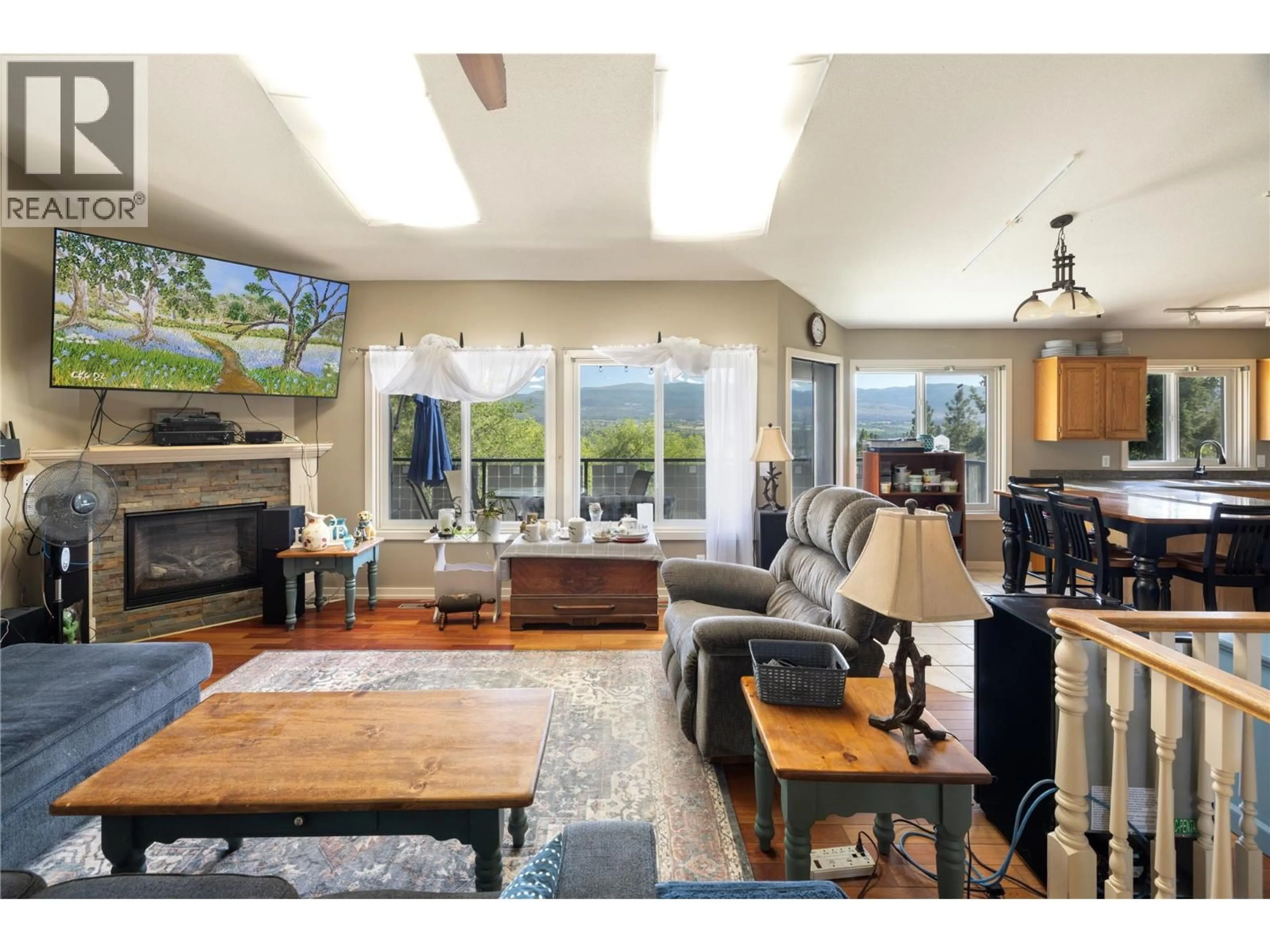 Living room with furniture, unknown for 2391 NAHANNI COURT, Kelowna British Columbia V1V1N1