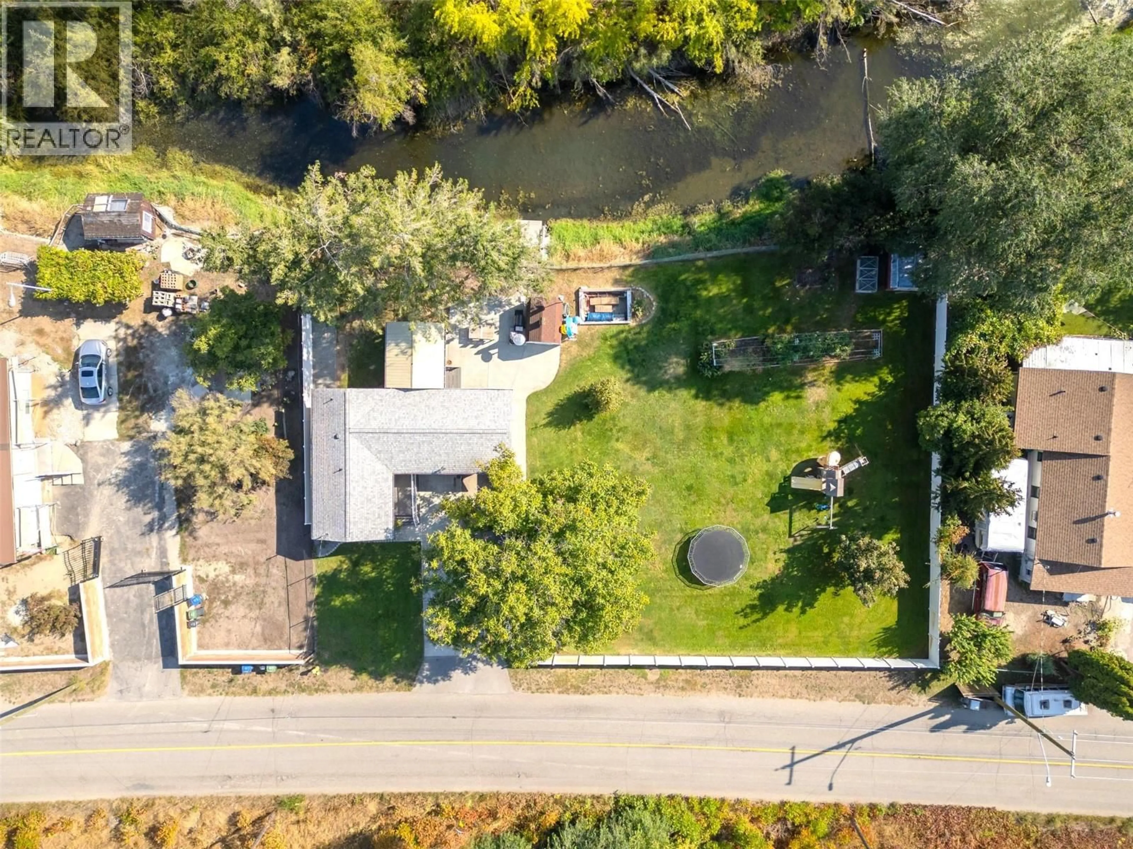 A pic from outside/outdoor area/front of a property/back of a property/a pic from drone, water/lake/river/ocean view for 5747 SAWMILL ROAD, Oliver British Columbia V0H1T0