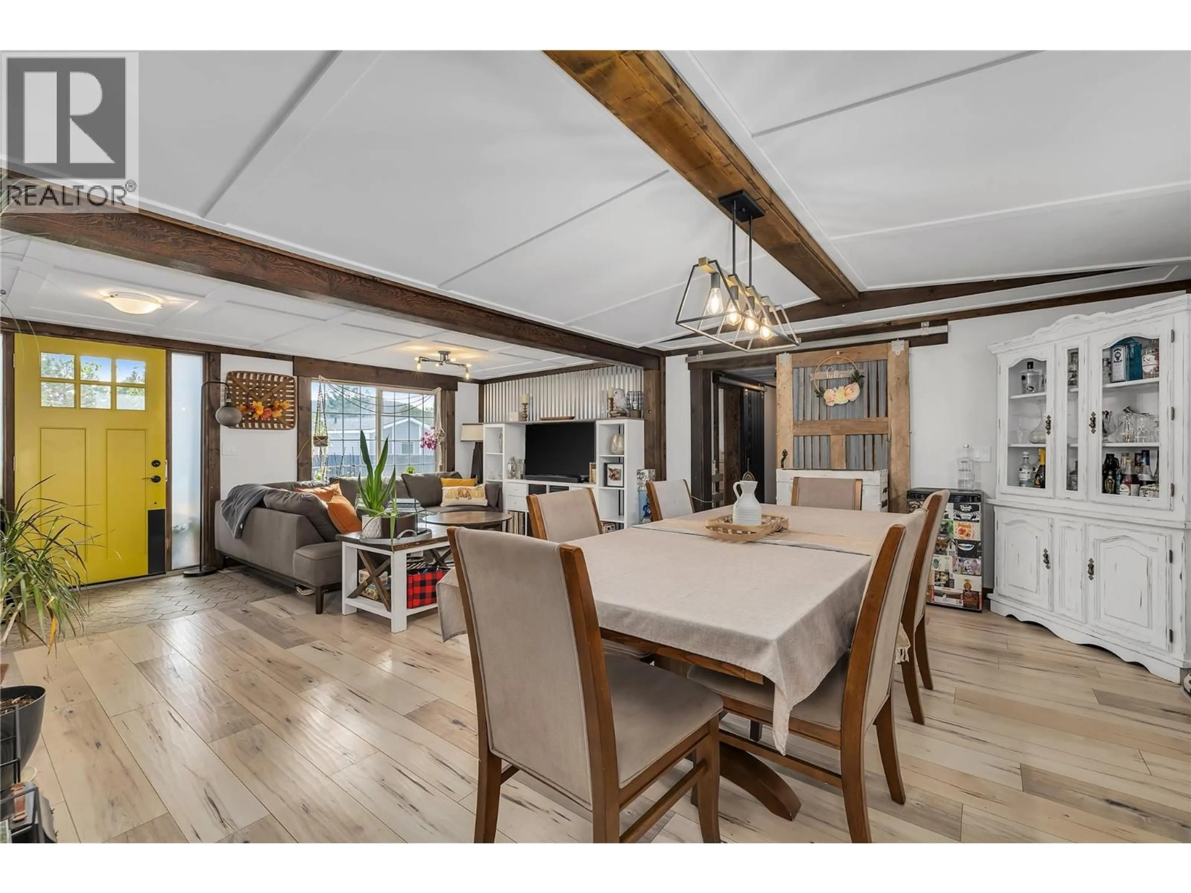 Dining room, wood/laminate floor for 142 - 9020 JIM BAILEY ROAD, Kelowna British Columbia V4V1E5