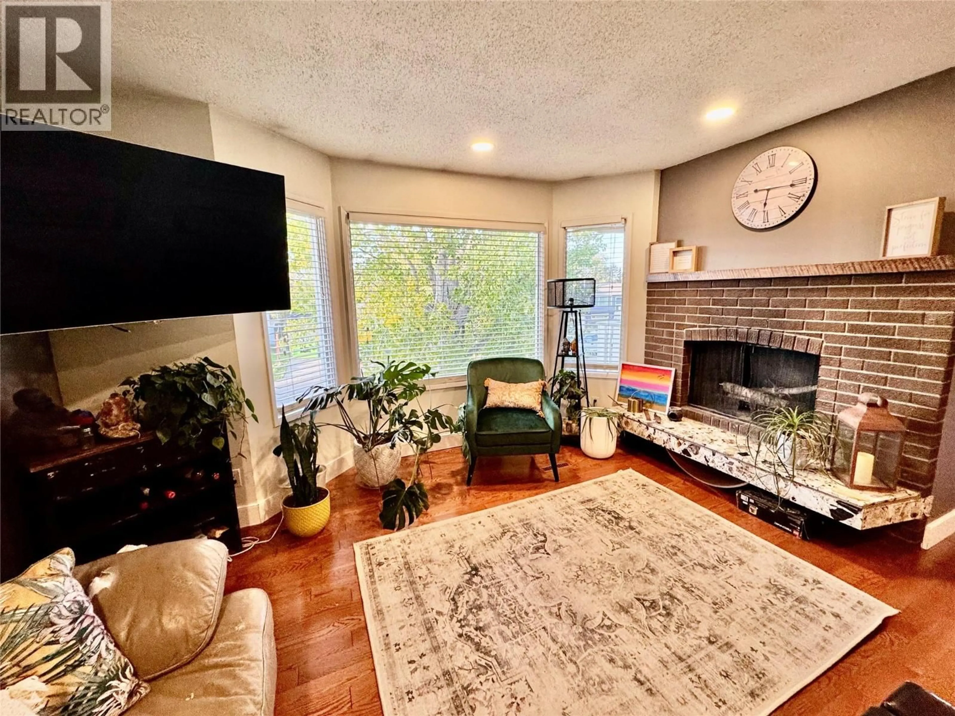 Living room with furniture, unknown for 1715 CEDARWOOD COURT, Dawson Creek British Columbia V1G4N4
