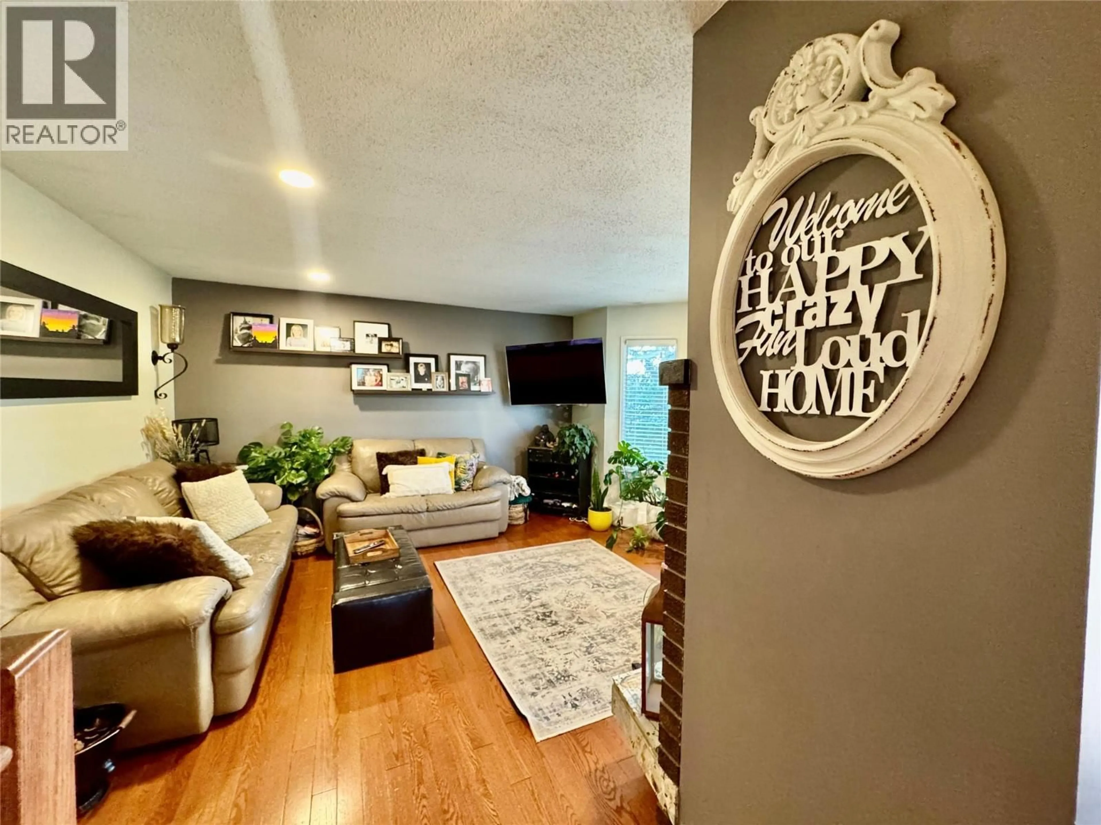 Living room with furniture, unknown for 1715 CEDARWOOD COURT, Dawson Creek British Columbia V1G4N4