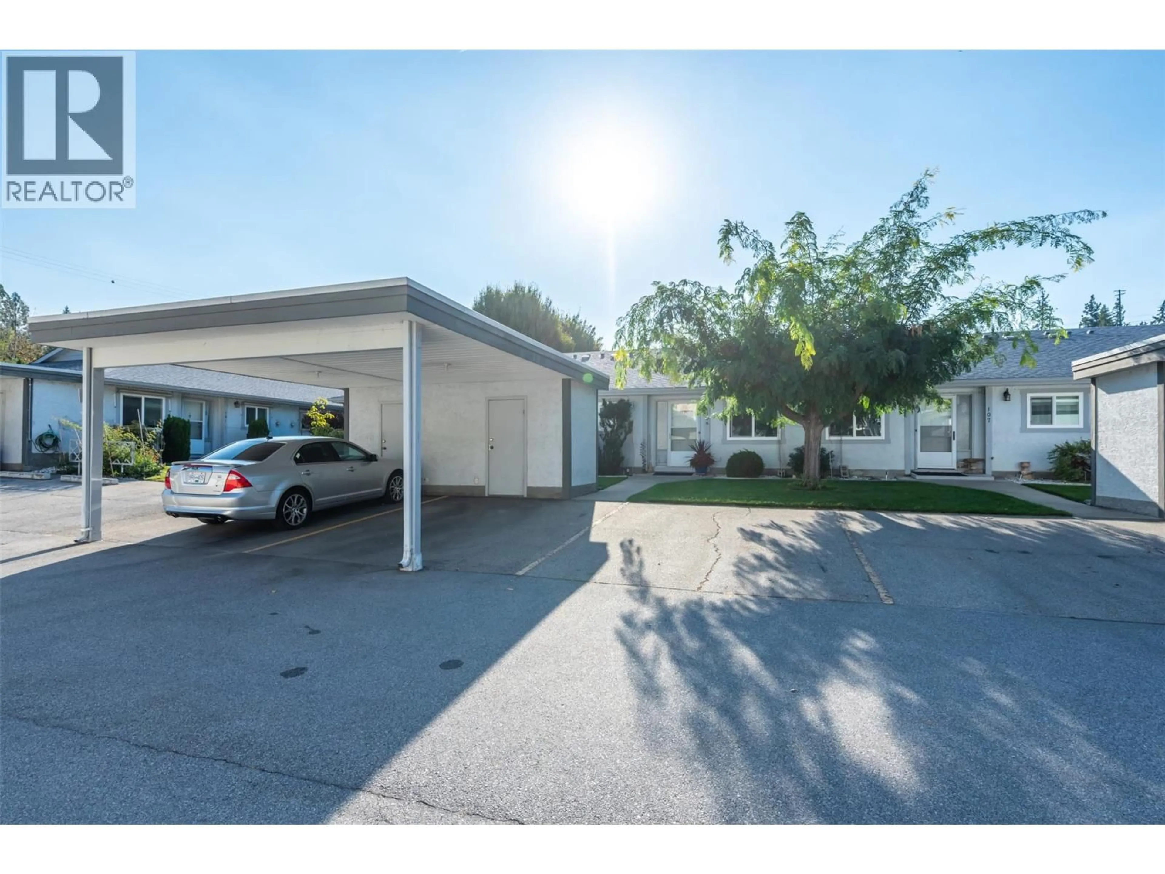 A pic from outside/outdoor area/front of a property/back of a property/a pic from drone, street for 106 - 1426 PENTICTON AVENUE, Penticton British Columbia V2A8C7