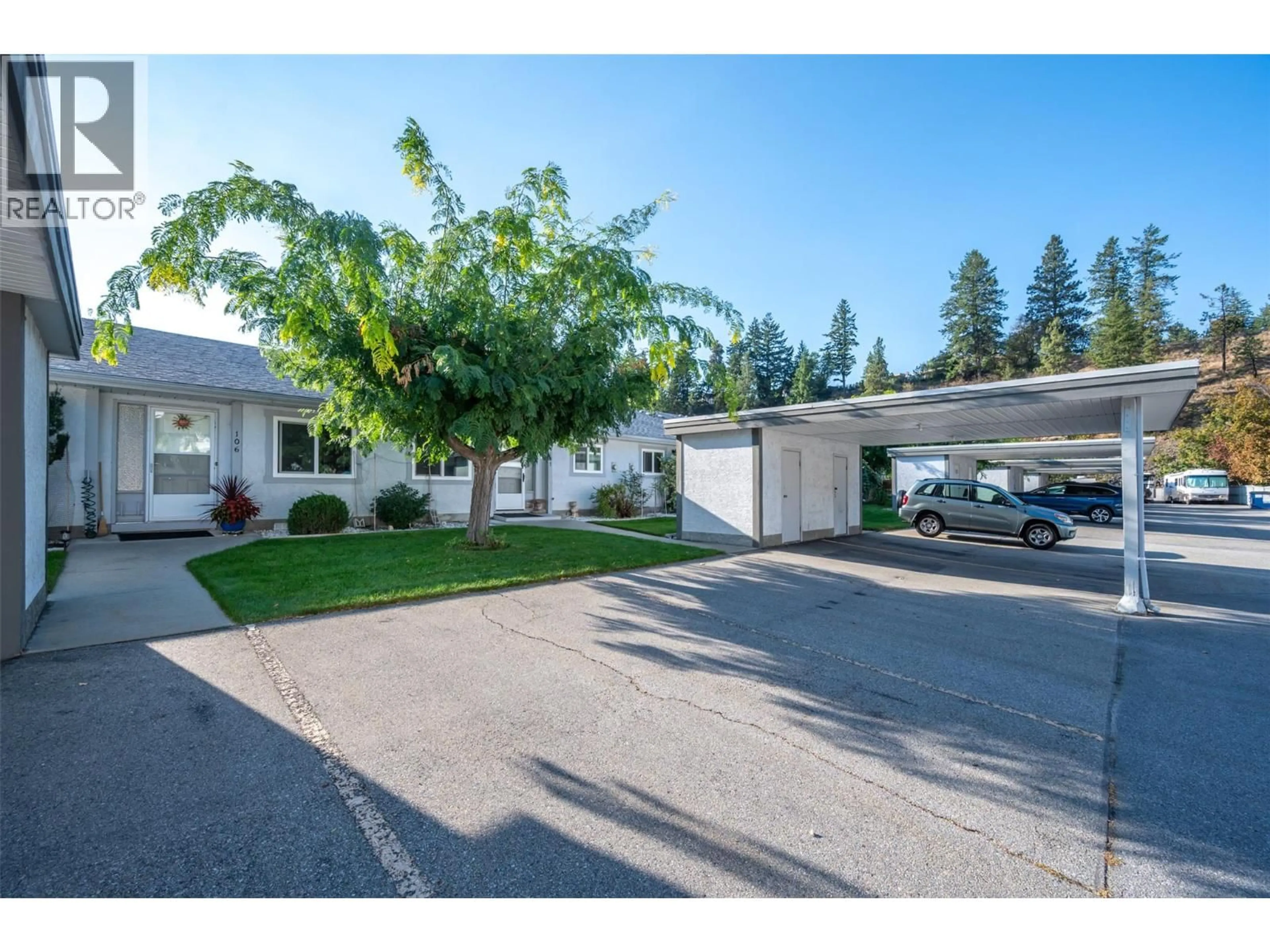 A pic from outside/outdoor area/front of a property/back of a property/a pic from drone, street for 106 - 1426 PENTICTON AVENUE, Penticton British Columbia V2A8C7