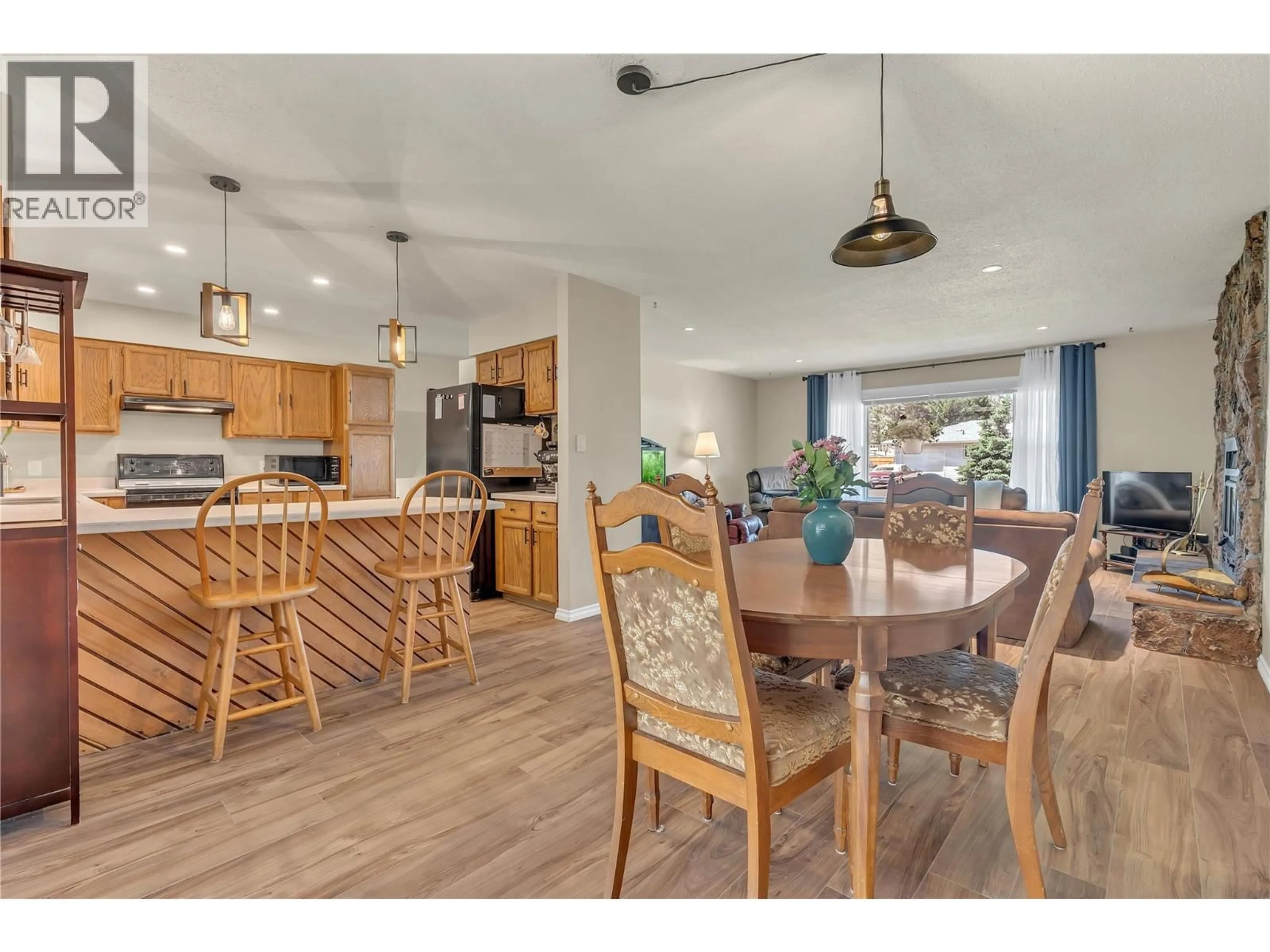 Open concept kitchen, wood/laminate floor for 531 3RD AVENUE, Keremeos British Columbia V1L2B3