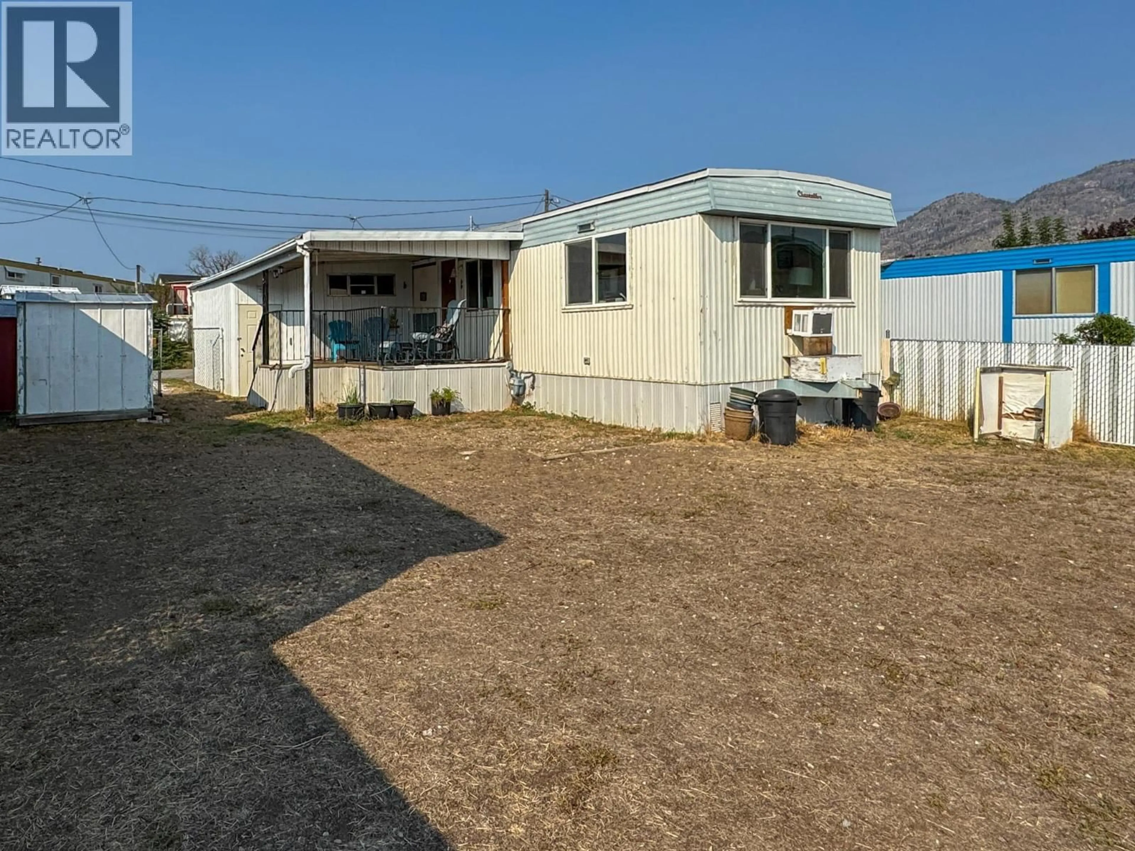 Home with vinyl exterior material, street for 4 - 7614 97TH STREET, Osoyoos British Columbia V0H1V5