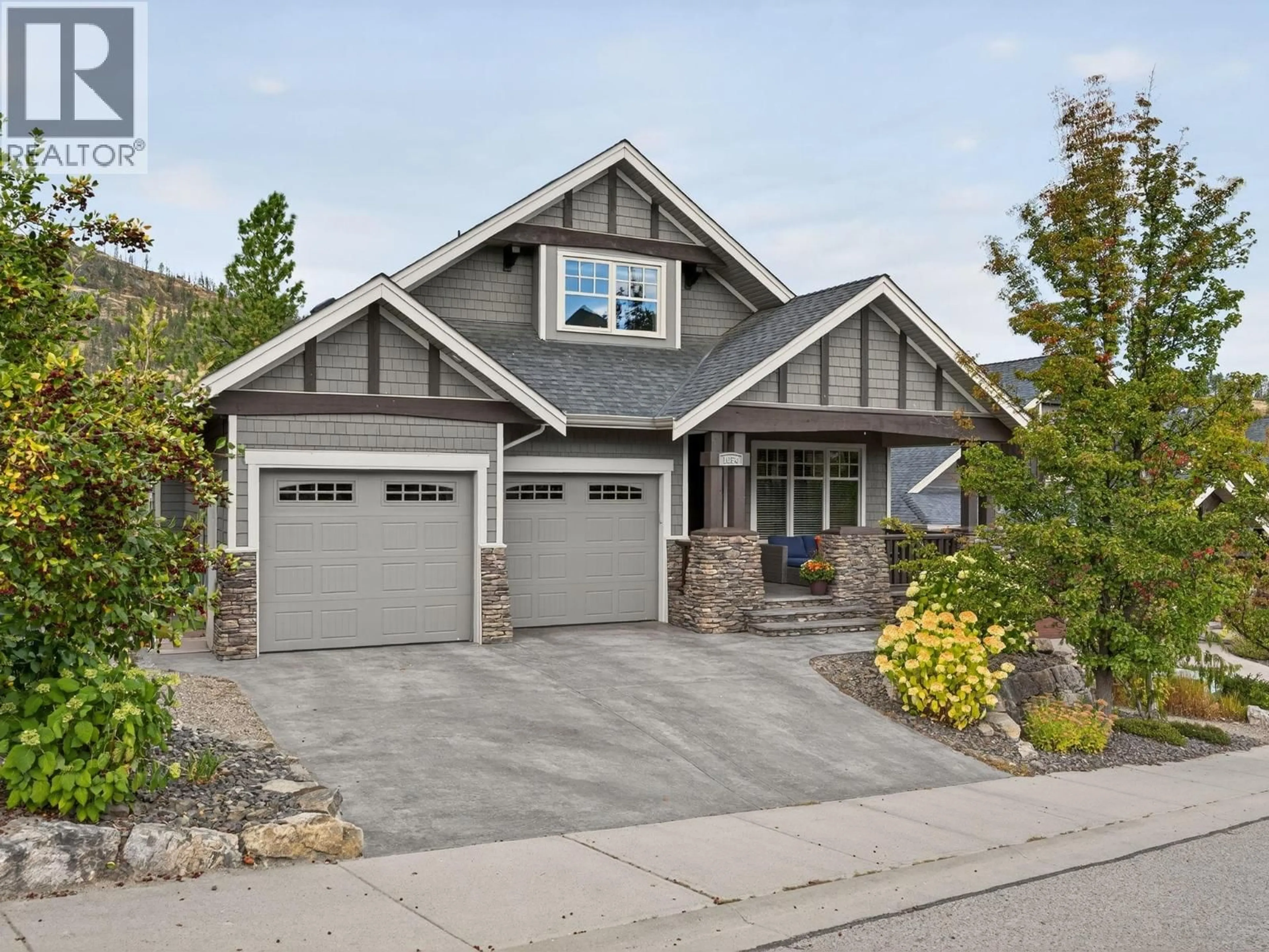 Home with vinyl exterior material, street for 1054 LONG RIDGE DRIVE, Kelowna British Columbia V1V2S1