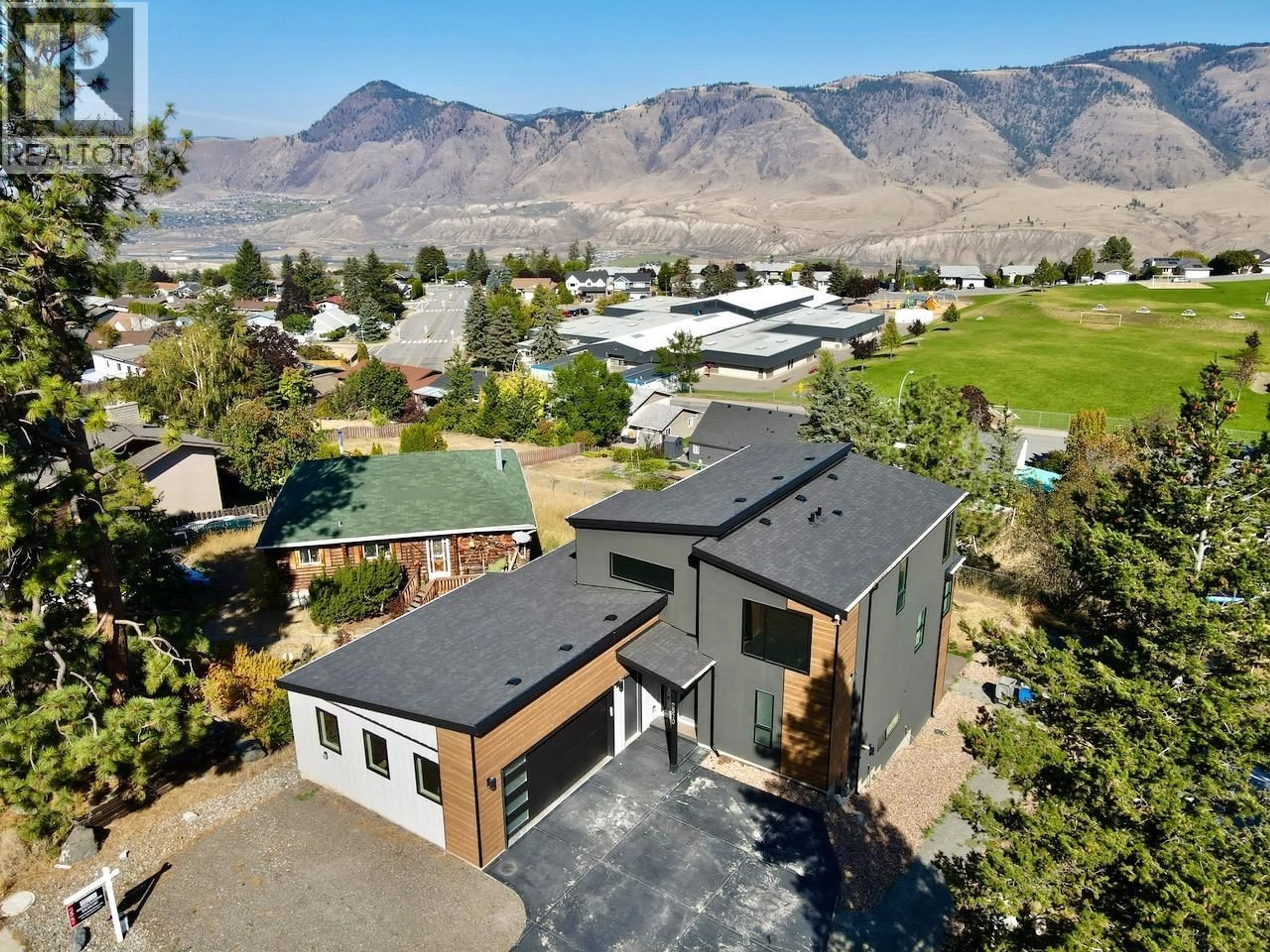 A pic from outside/outdoor area/front of a property/back of a property/a pic from drone, mountain view for 2570 SKEENA DR. DRIVE, Kamloops British Columbia V2E1V5