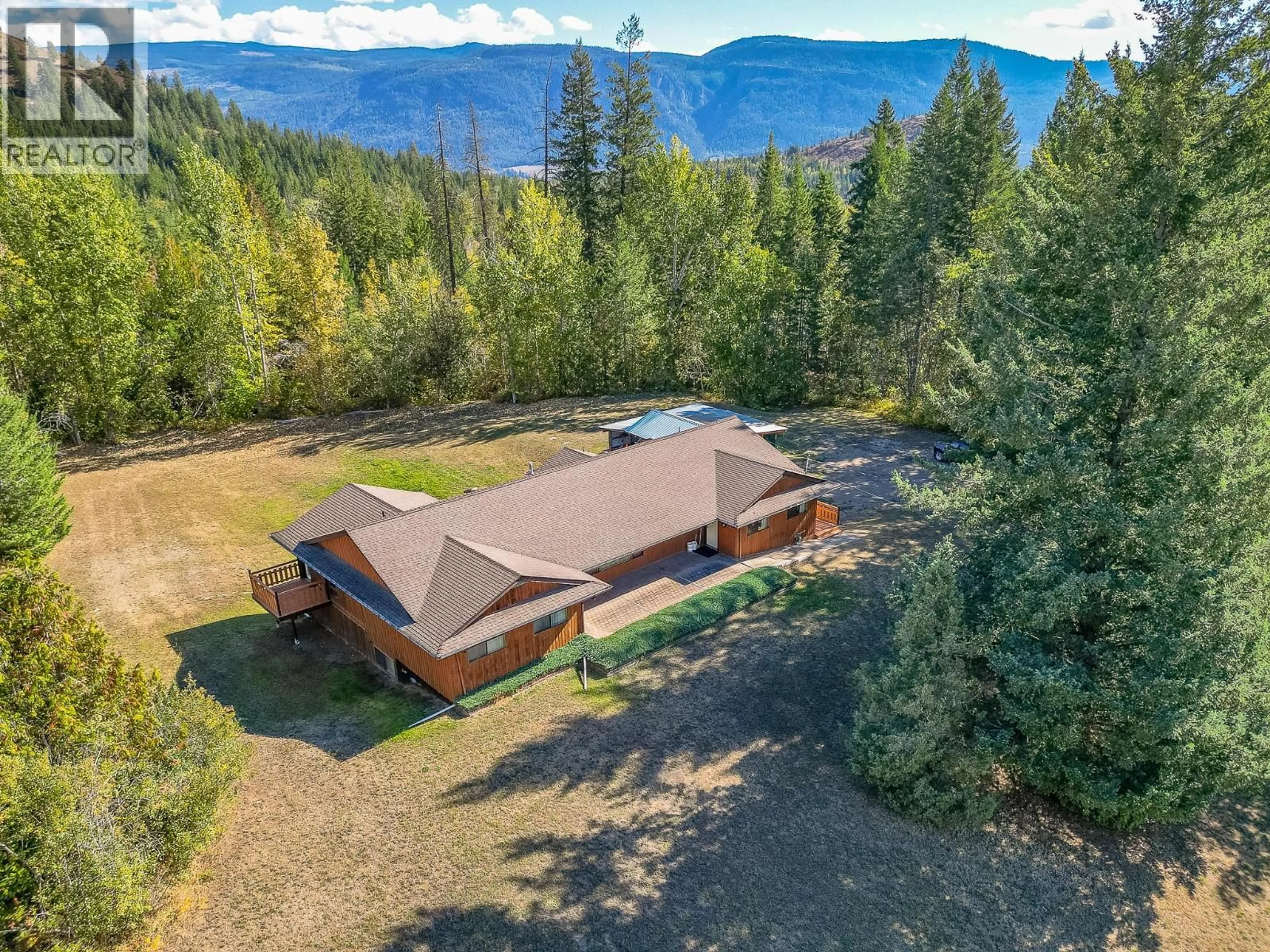 A pic from outside/outdoor area/front of a property/back of a property/a pic from drone, mountain view for 153 HADOW ROAD SOUTHEAST, Salmon Arm British Columbia V1E2X5