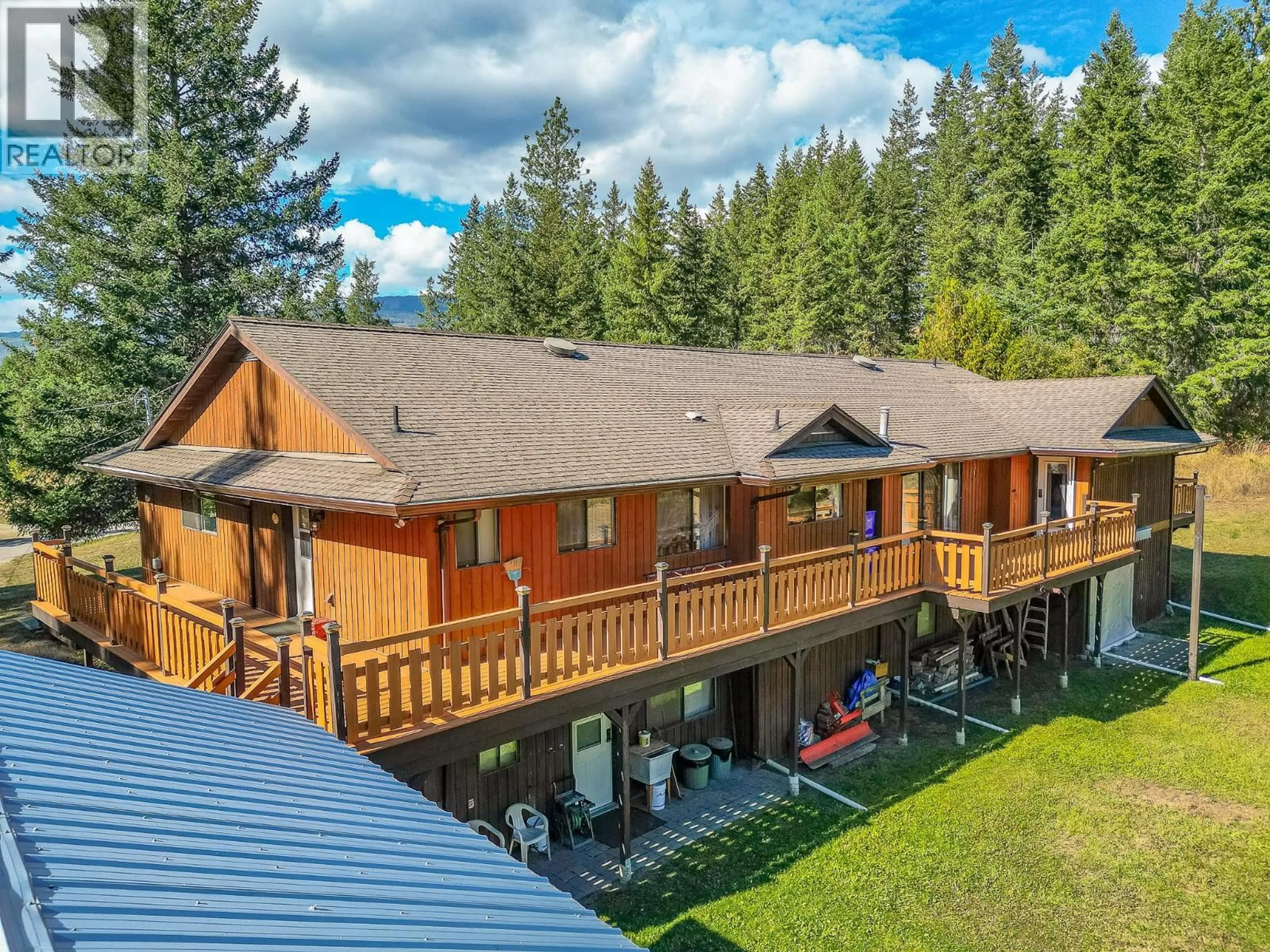 A pic from outside/outdoor area/front of a property/back of a property/a pic from drone, mountain view for 153 HADOW ROAD SOUTHEAST, Salmon Arm British Columbia V1E2X5