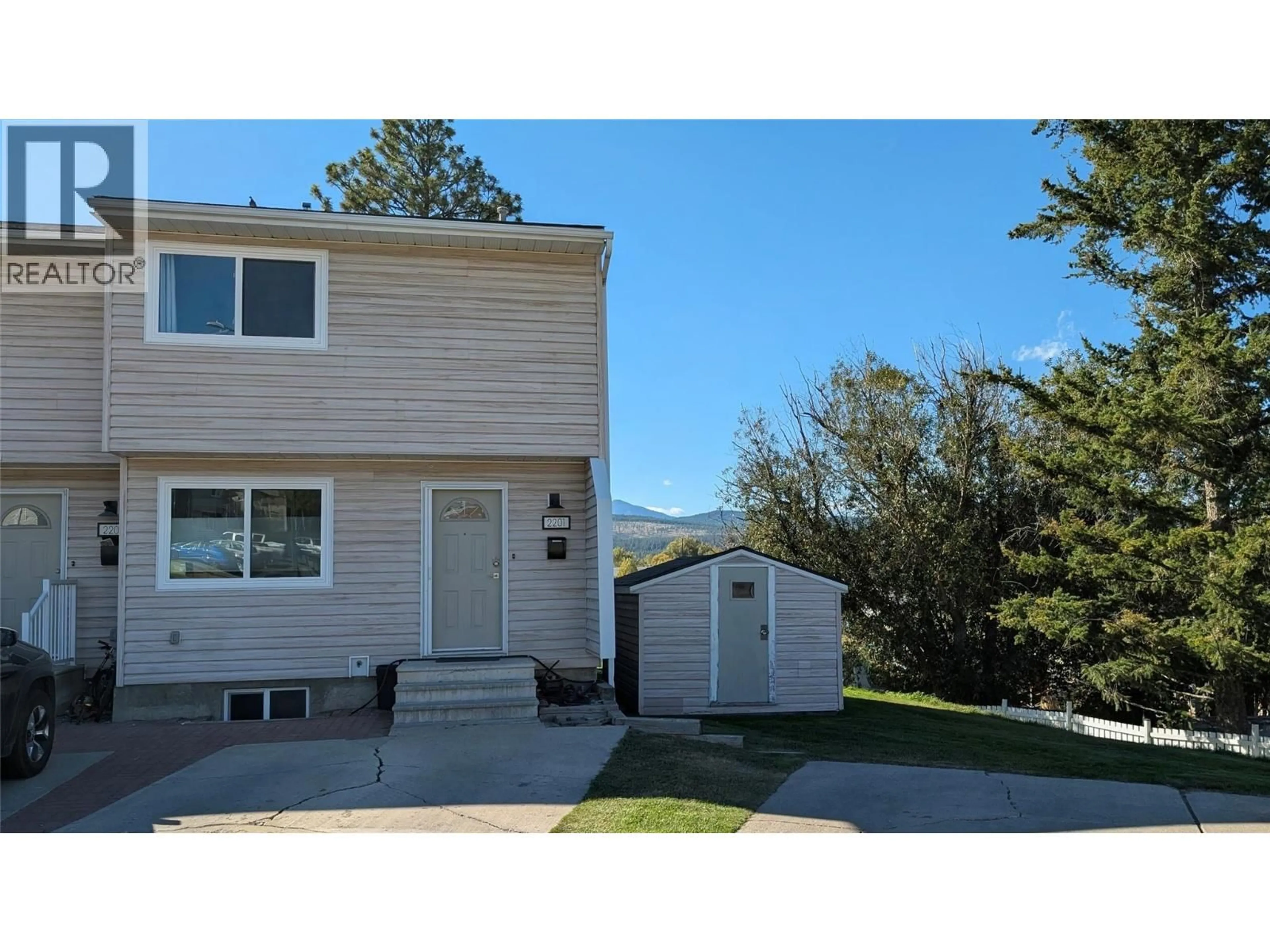 Home with vinyl exterior material, street for 2201 3RD STREET NORTH, Cranbrook British Columbia V1C5G7