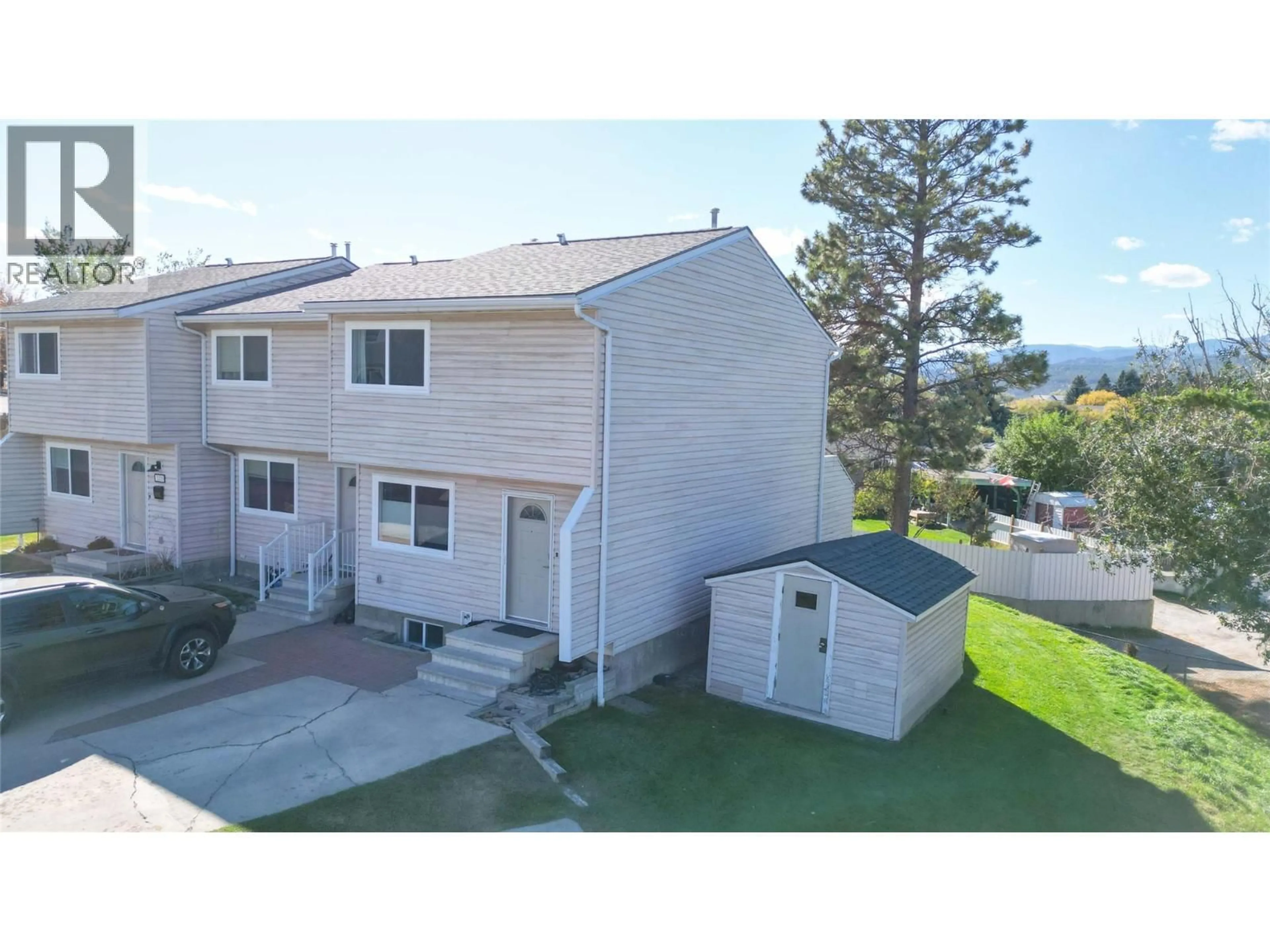 A pic from outside/outdoor area/front of a property/back of a property/a pic from drone, water/lake/river/ocean view for 2201 3RD STREET NORTH, Cranbrook British Columbia V1C5G7