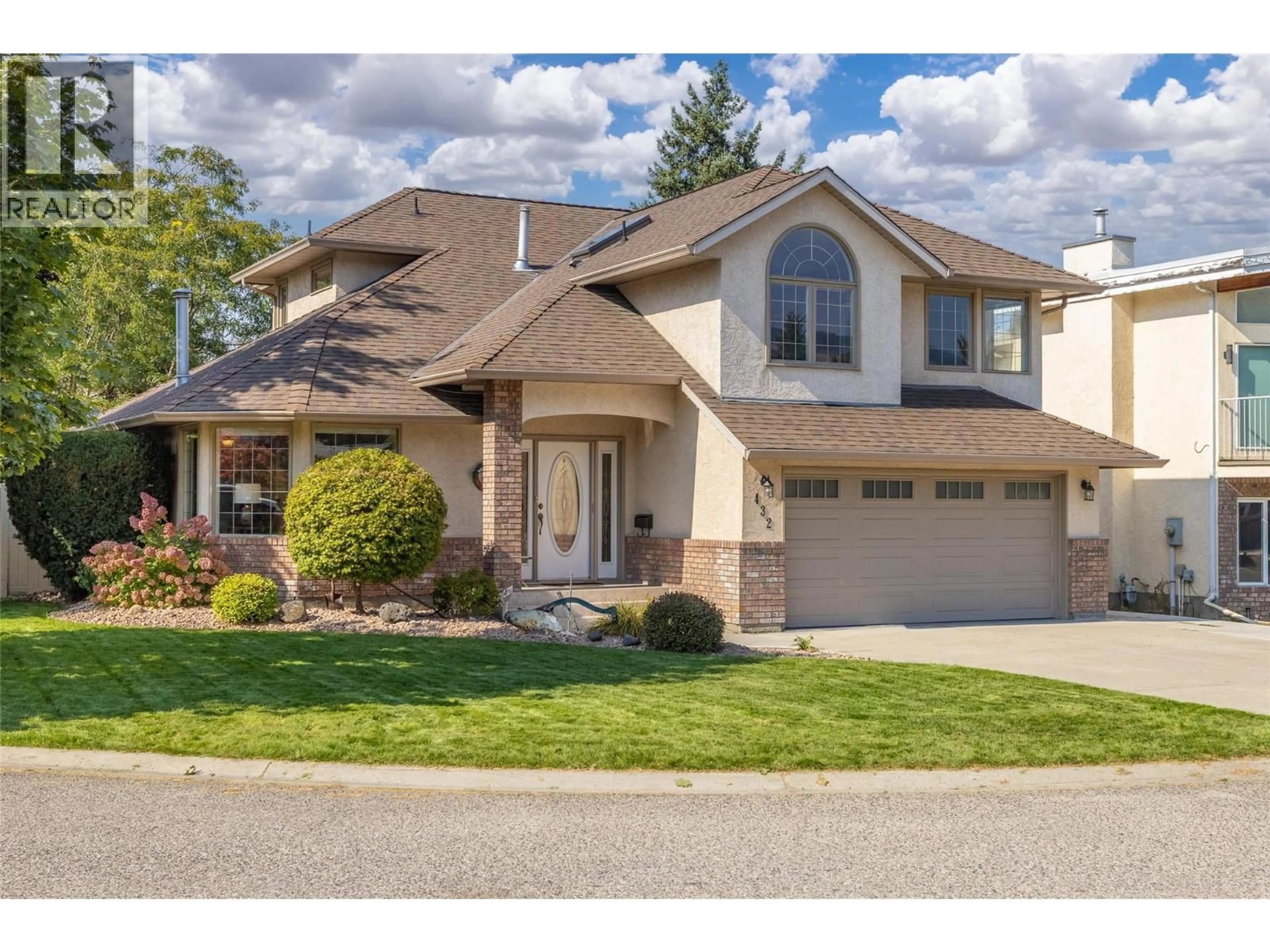Home with vinyl exterior material, street for 432 YAMAOKA COURT, Kelowna British Columbia V1X6B3