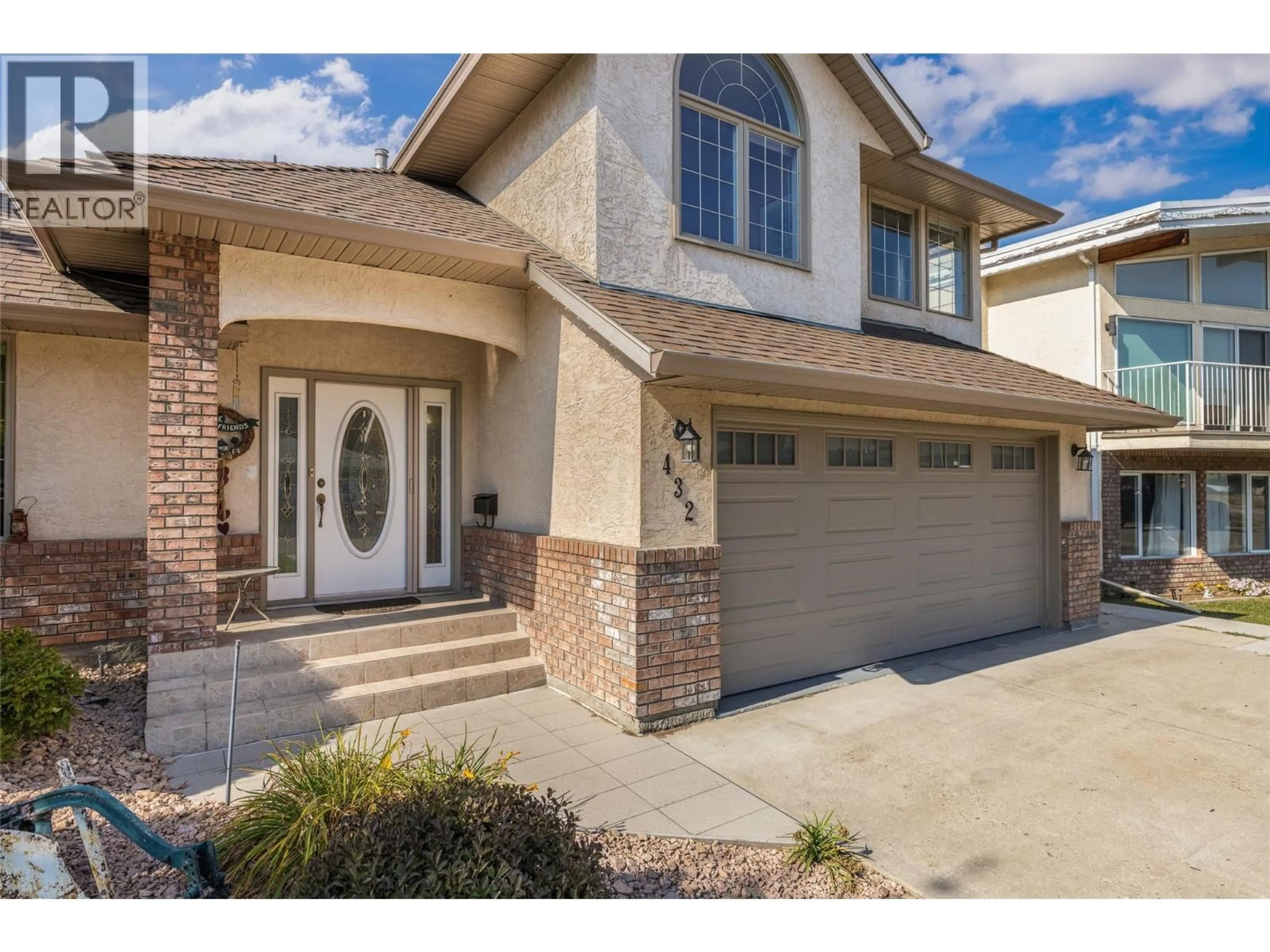 Home with brick exterior material, street for 432 YAMAOKA COURT, Kelowna British Columbia V1X6B3