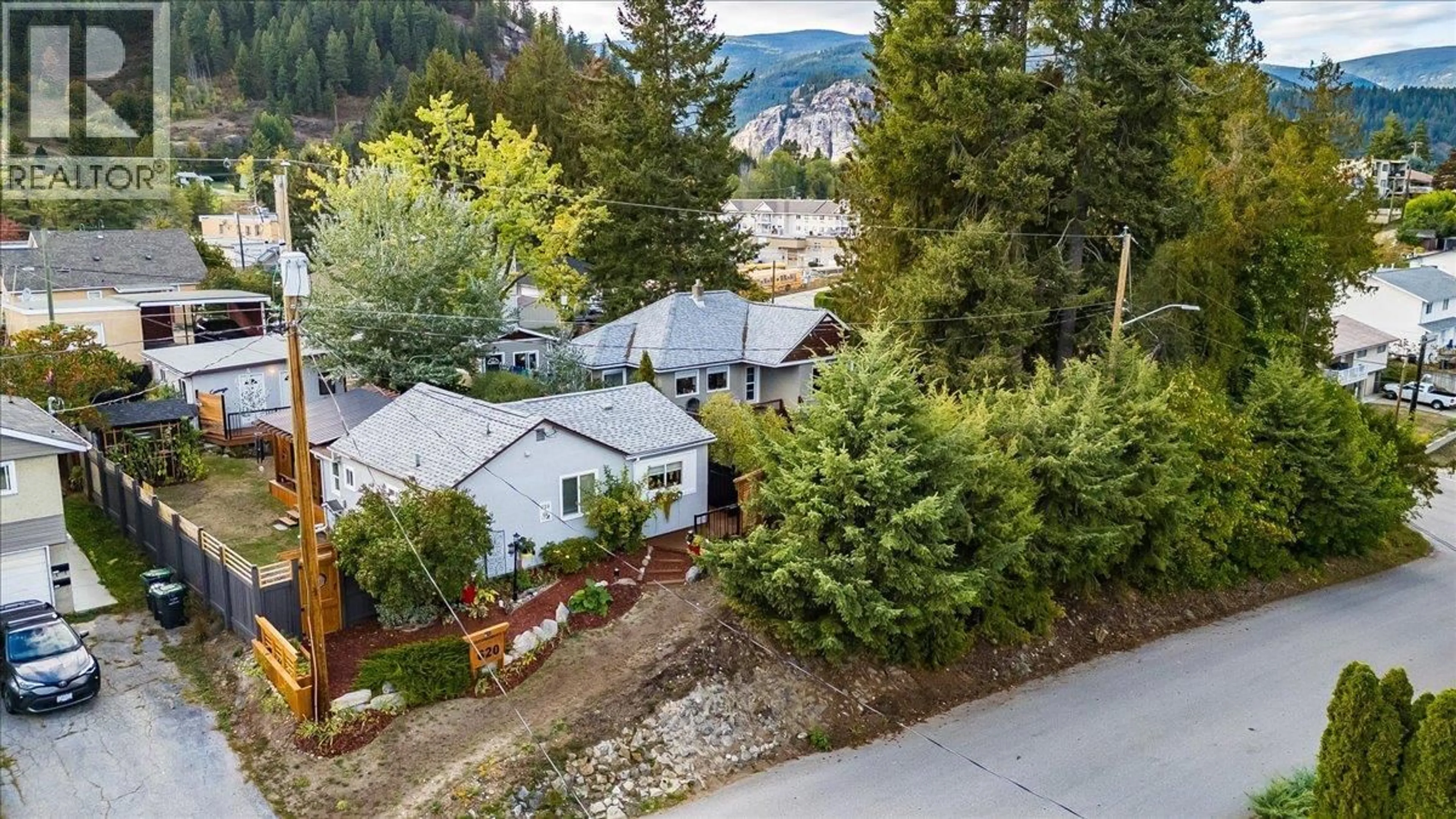A pic from outside/outdoor area/front of a property/back of a property/a pic from drone, water/lake/river/ocean view for 620 10TH AVENUE, Castlegar British Columbia V1N1K9