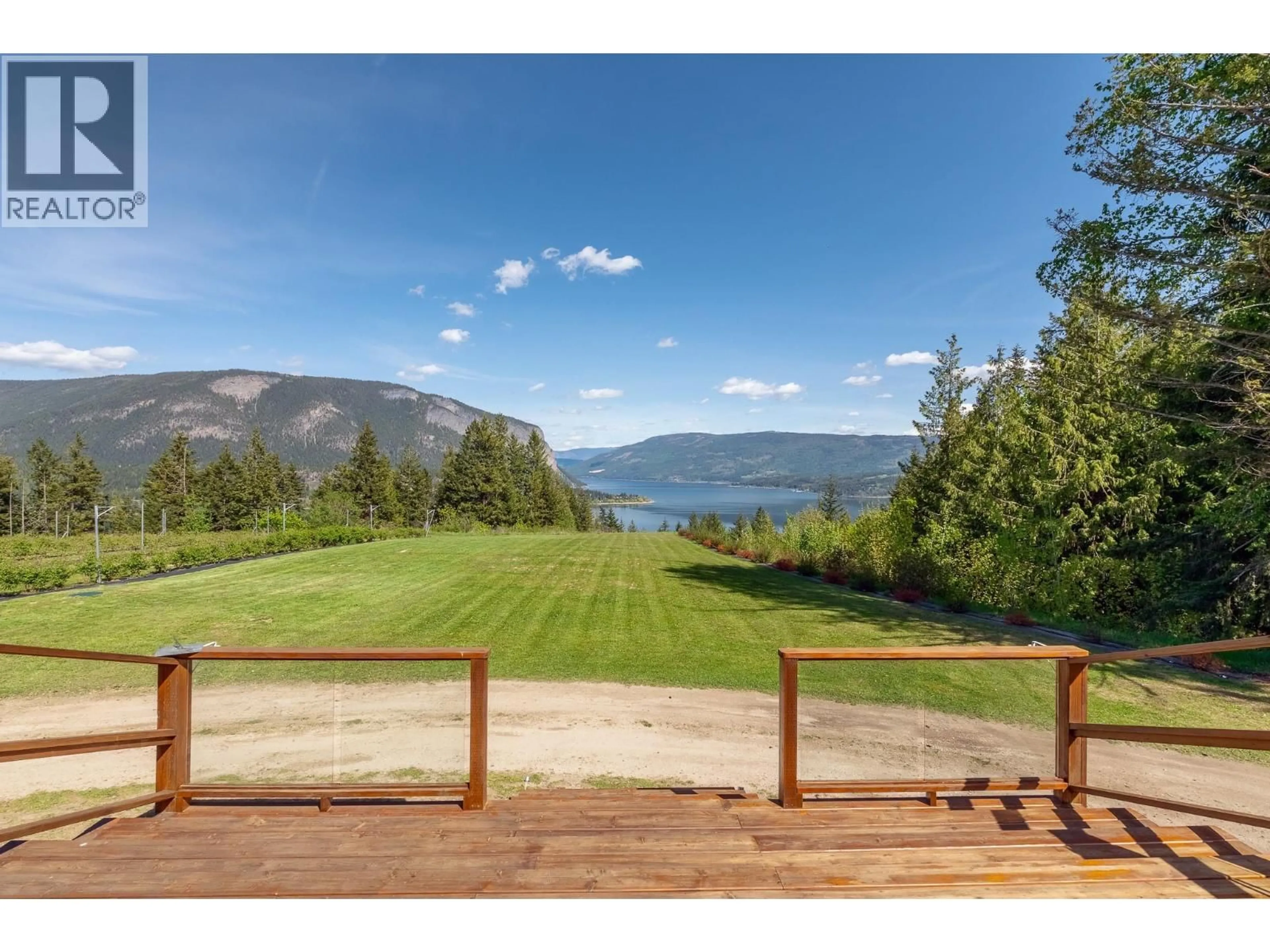 A pic from outside/outdoor area/front of a property/back of a property/a pic from drone, water/lake/river/ocean view for 285 KAULT HILL ROAD, Salmon Arm British Columbia V1E3A4