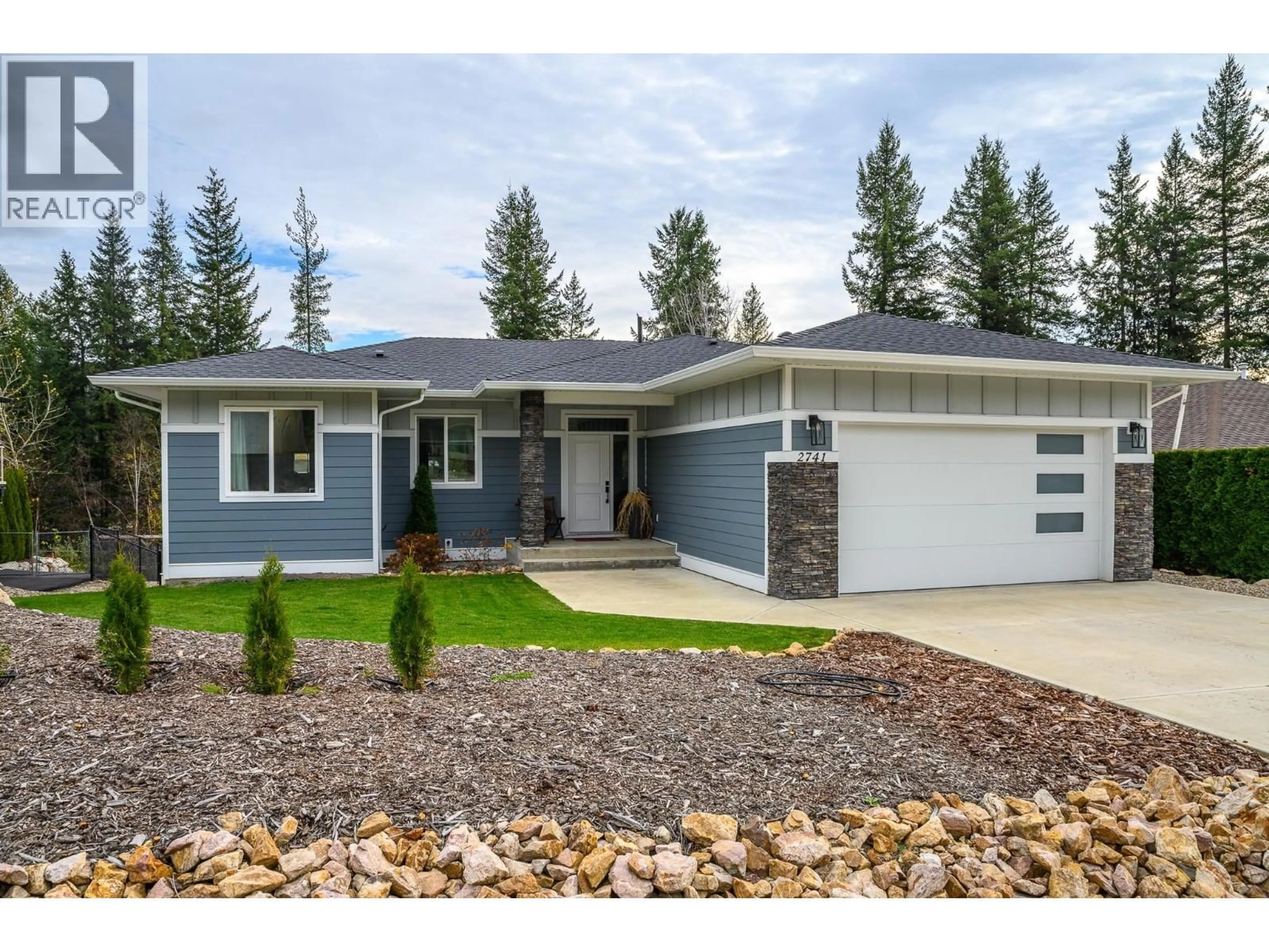 Home with vinyl exterior material, street for 2741 GOLF COURSE DRIVE, Blind Bay British Columbia V0E1H2