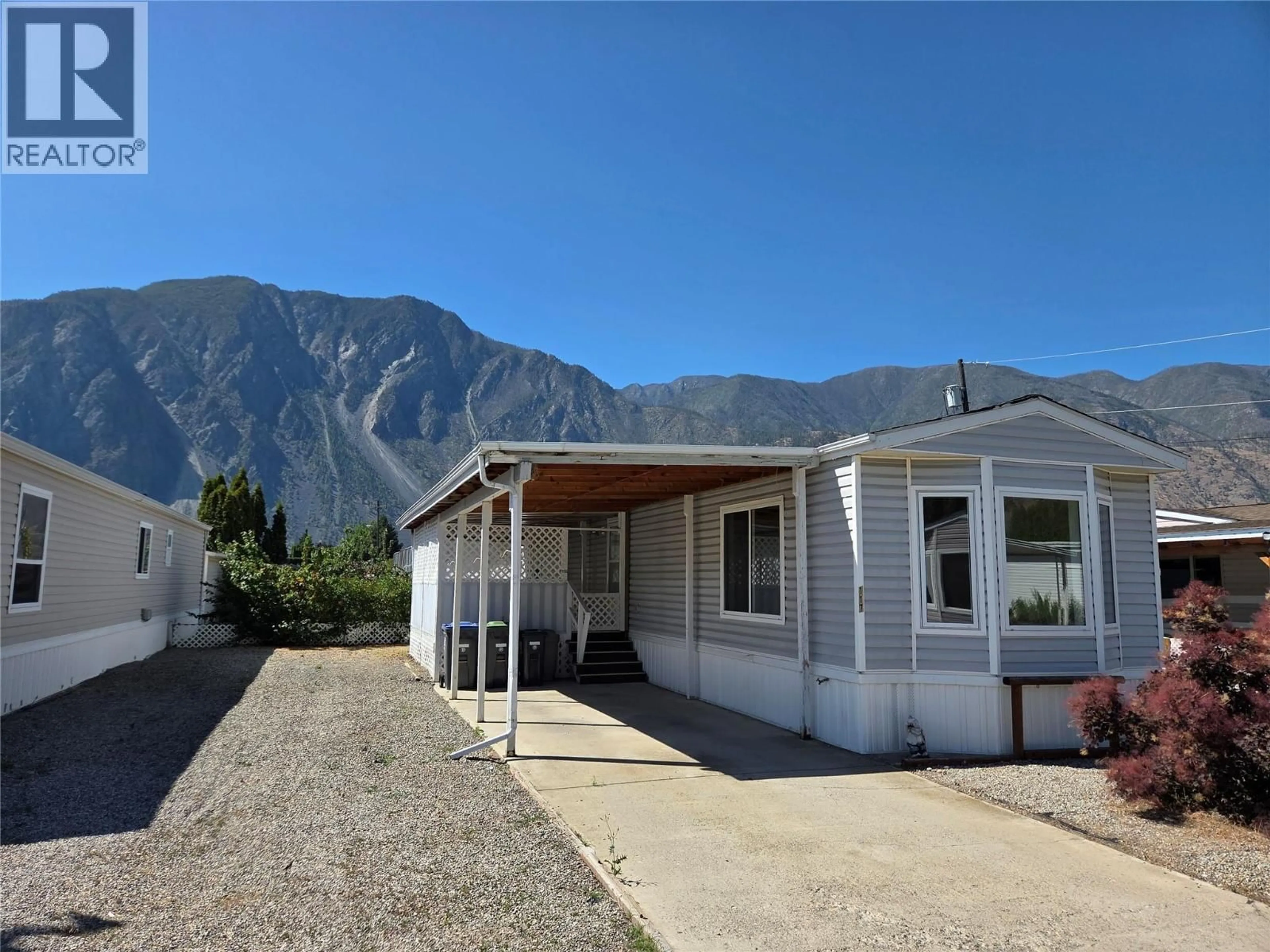 Home with vinyl exterior material, mountain view for 117 - 914 BLAKEBOROUGH AVENUE, Keremeos British Columbia V0X1N2